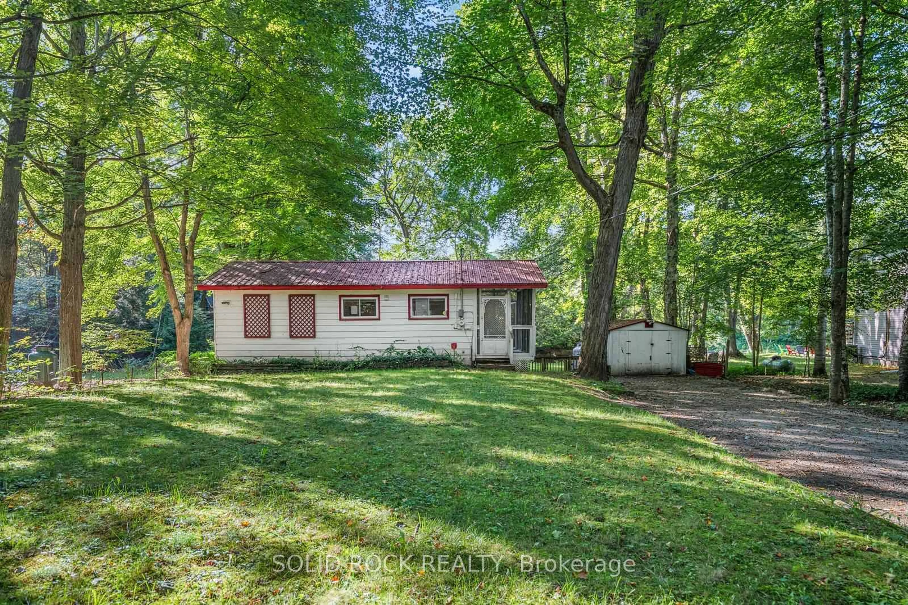 A pic from outside/outdoor area/front of a property/back of a property/a pic from drone, unknown for 7465 East River Rd, Ramara Ontario L0K 2B0