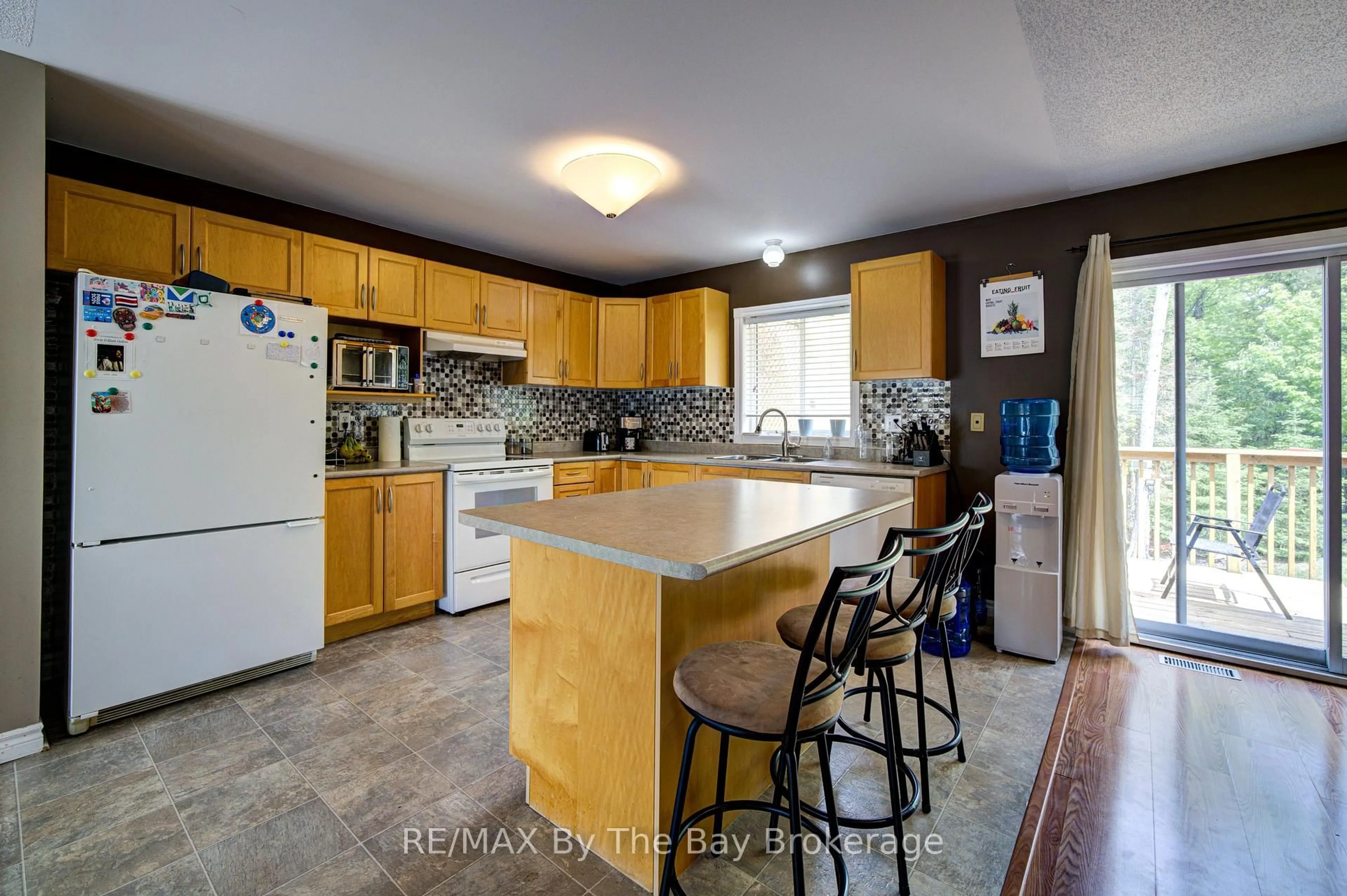 Open concept kitchen, ceramic/tile floor for 50 Donato Way, Wasaga Beach Ontario L9Z 1R9
