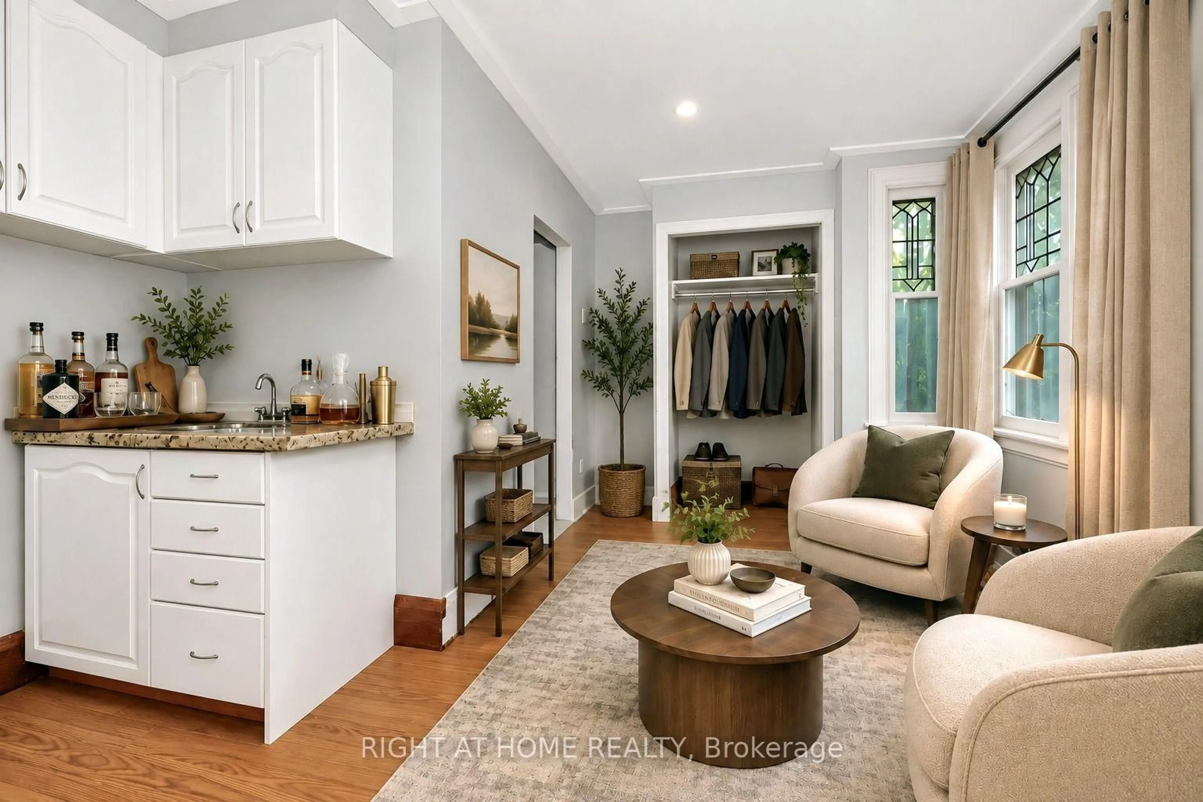 Living room with furniture, wood/laminate floor for 85 Maple Ave, Barrie Ontario L4N 1S1