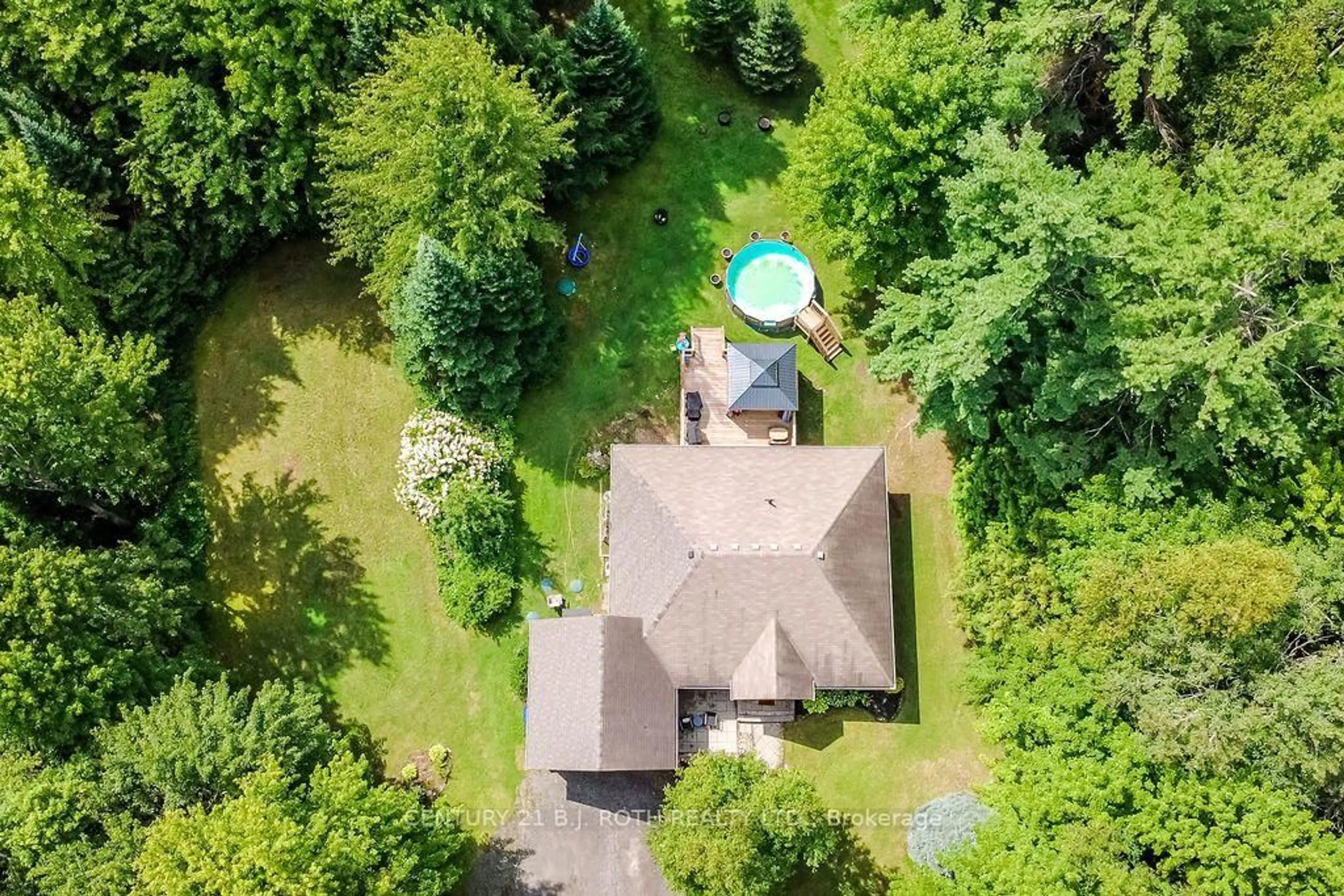 A pic from outside/outdoor area/front of a property/back of a property/a pic from drone, forest/trees view for 2604 The Birches Rd, Severn Ontario L0K 2B0
