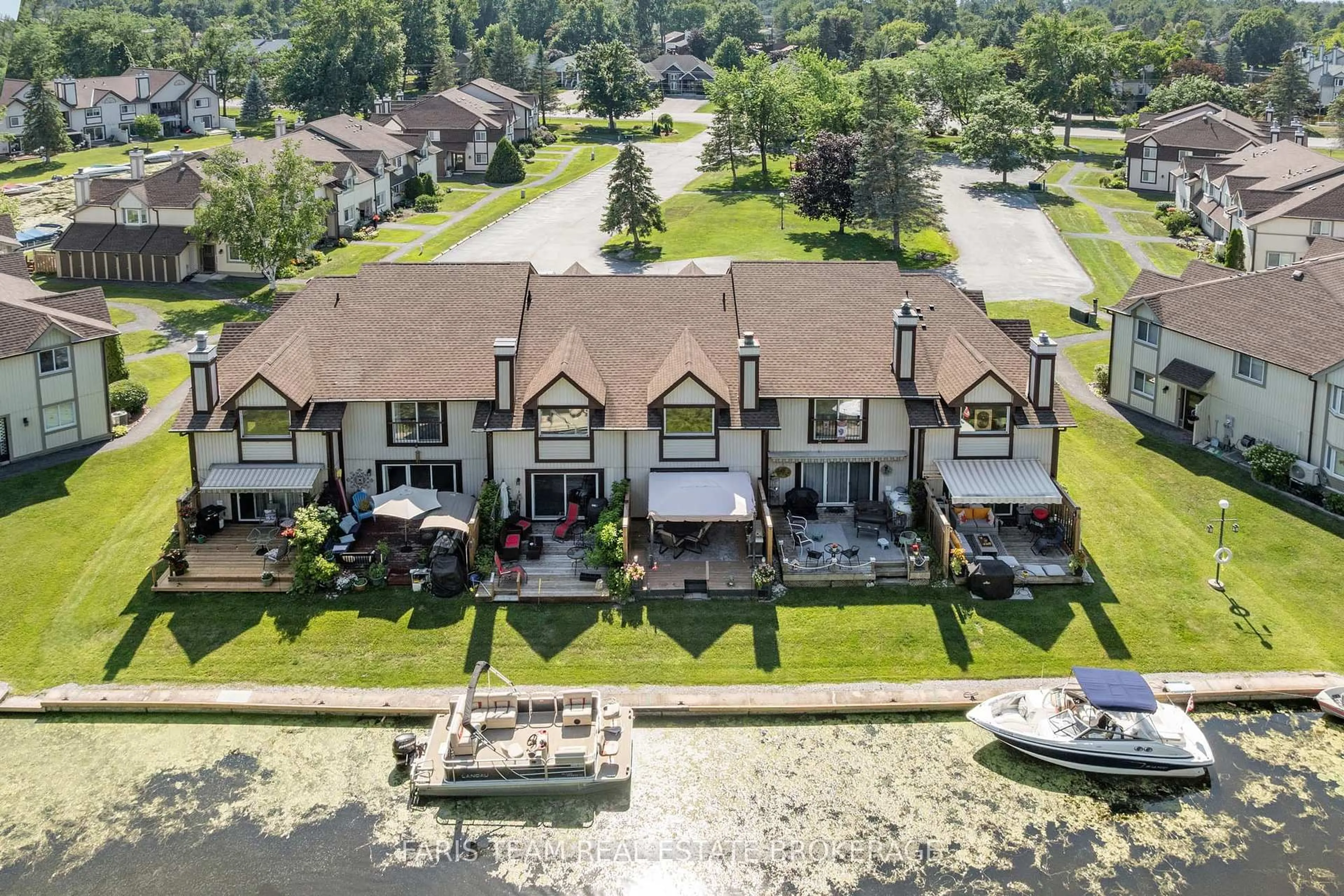 A pic from outside/outdoor area/front of a property/back of a property/a pic from drone, water/lake/river/ocean view for 21 Laguna Pkwy #16, Ramara Ontario L0K 1B0
