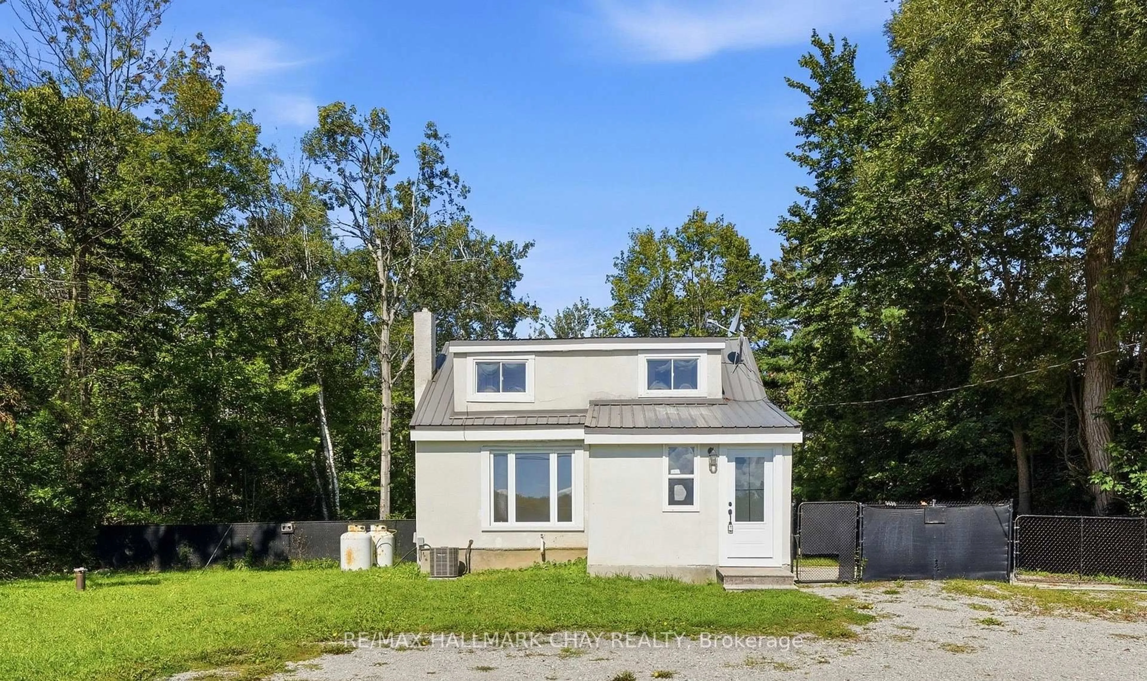 Home with vinyl exterior material, street for 8410 11 Highway, Severn Ontario L3V 6H3