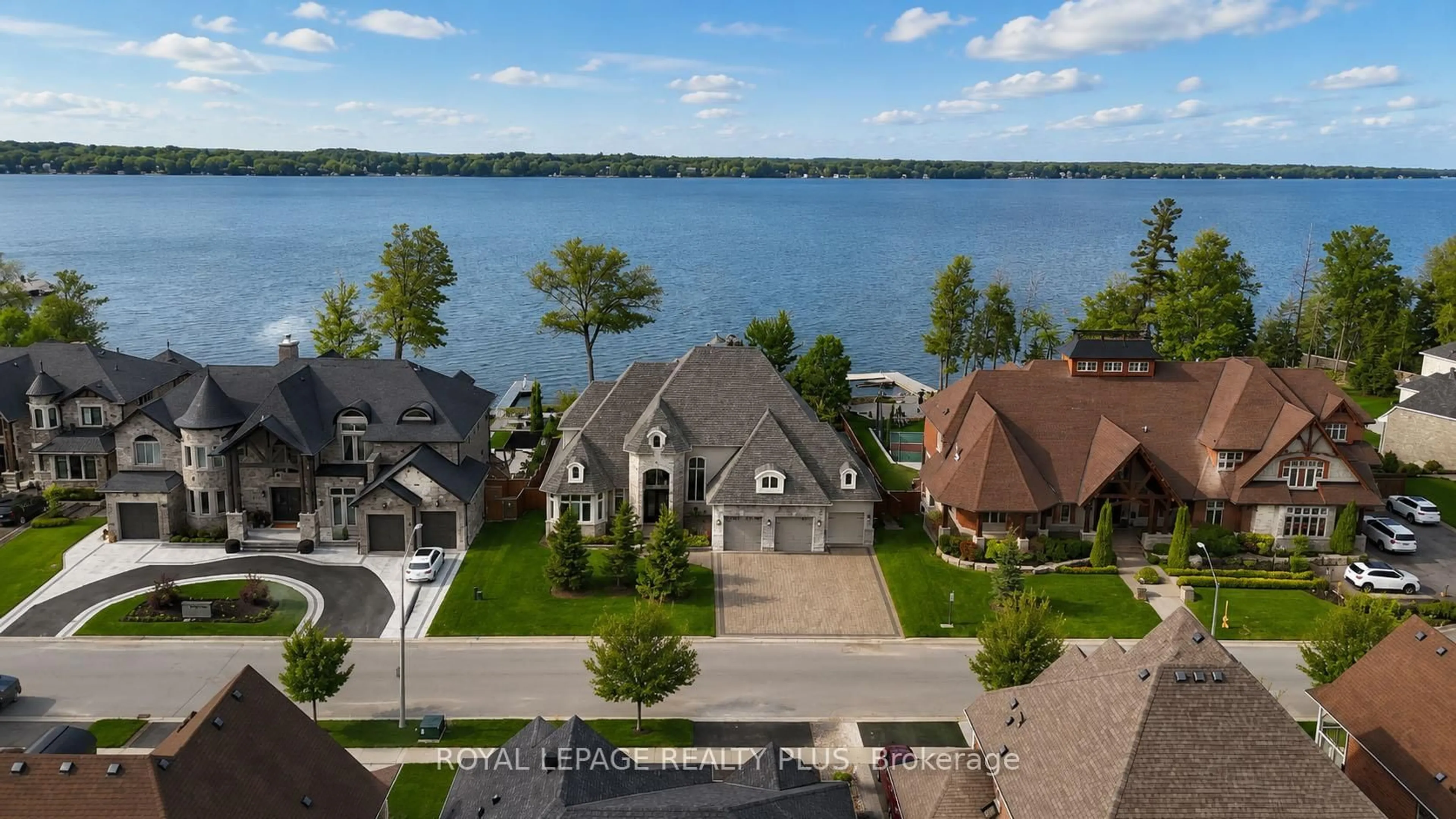 A pic from outside/outdoor area/front of a property/back of a property/a pic from drone, water/lake/river/ocean view for 39 Plunkett Crt, Barrie Ontario L4N 6M3