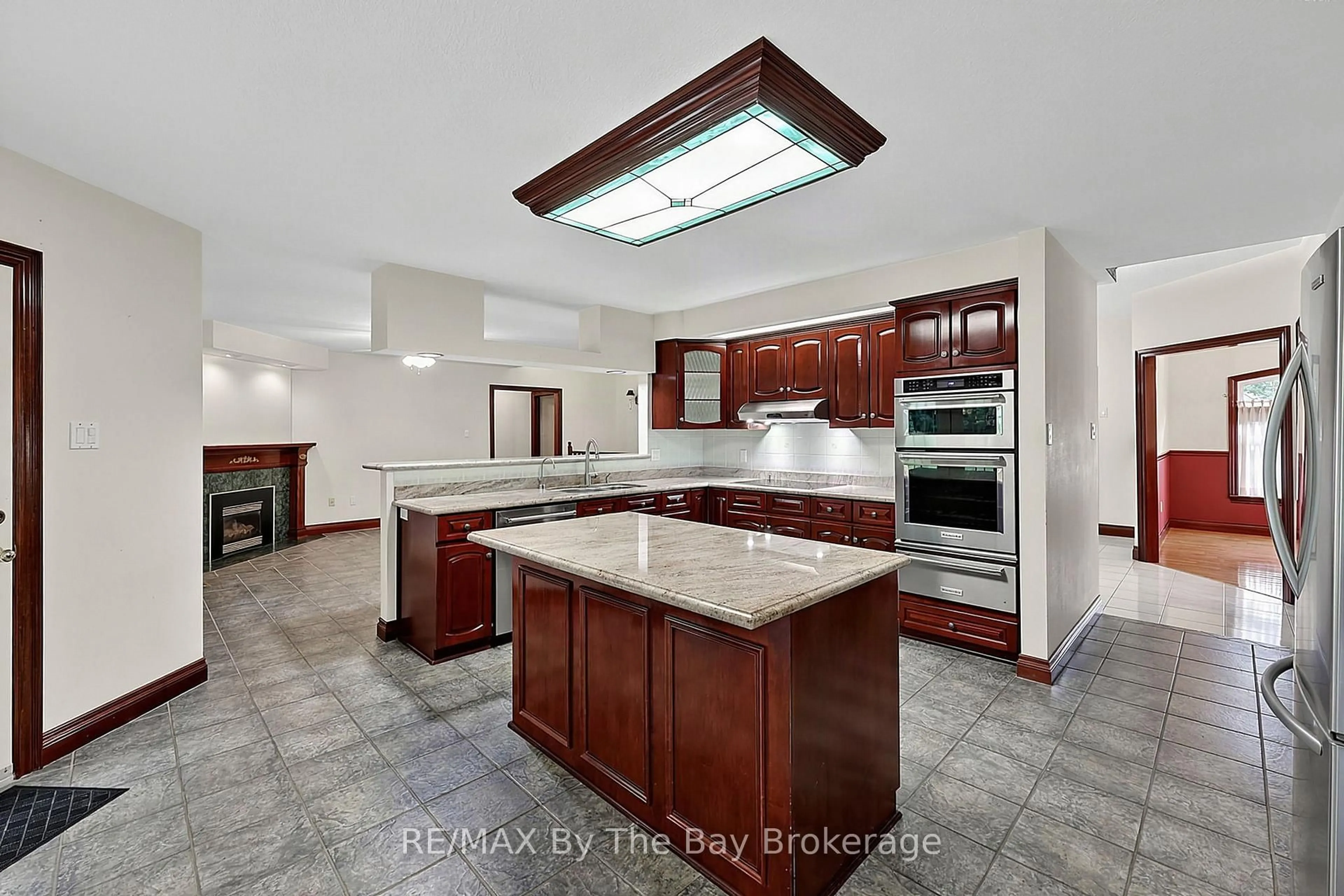 Open concept kitchen, ceramic/tile floor for 90 Goldfinch Cres, Tiny Ontario L0L 2J0