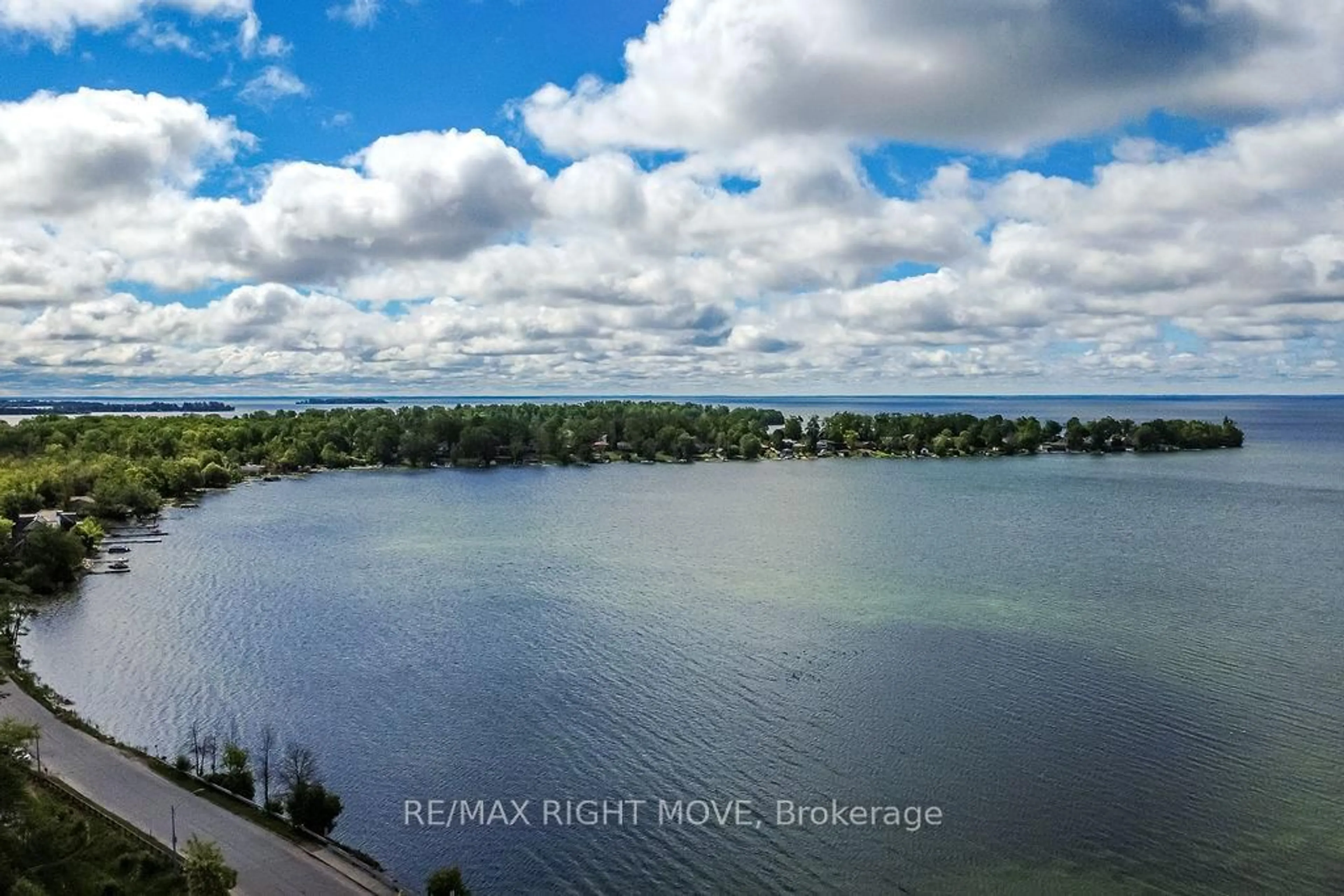A pic from outside/outdoor area/front of a property/back of a property/a pic from drone, water/lake/river/ocean view for 12 LANKIN Blvd #31, Orillia Ontario L3V 6T2
