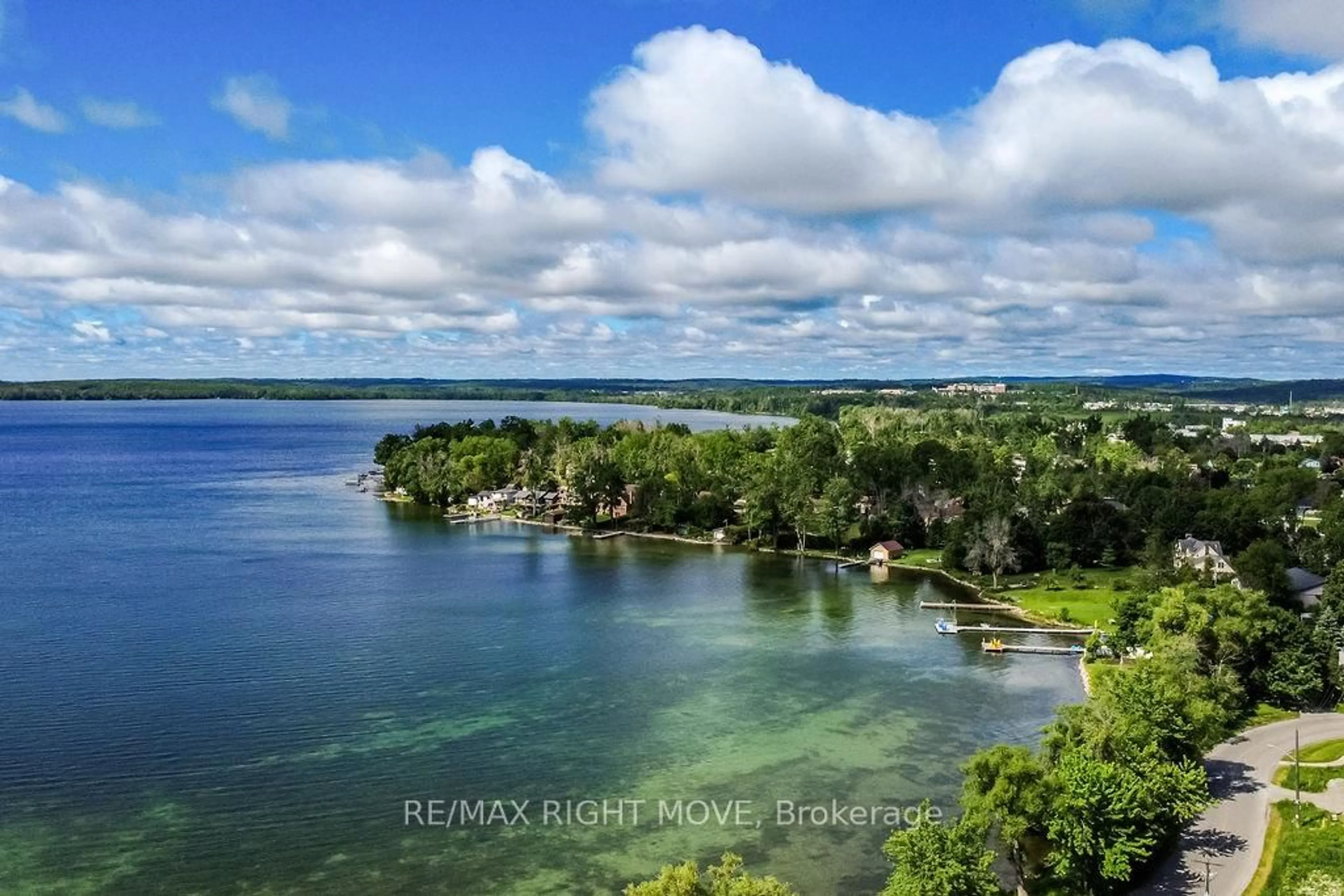 A pic from outside/outdoor area/front of a property/back of a property/a pic from drone, water/lake/river/ocean view for 12 LANKIN Blvd #31, Orillia Ontario L3V 6T2
