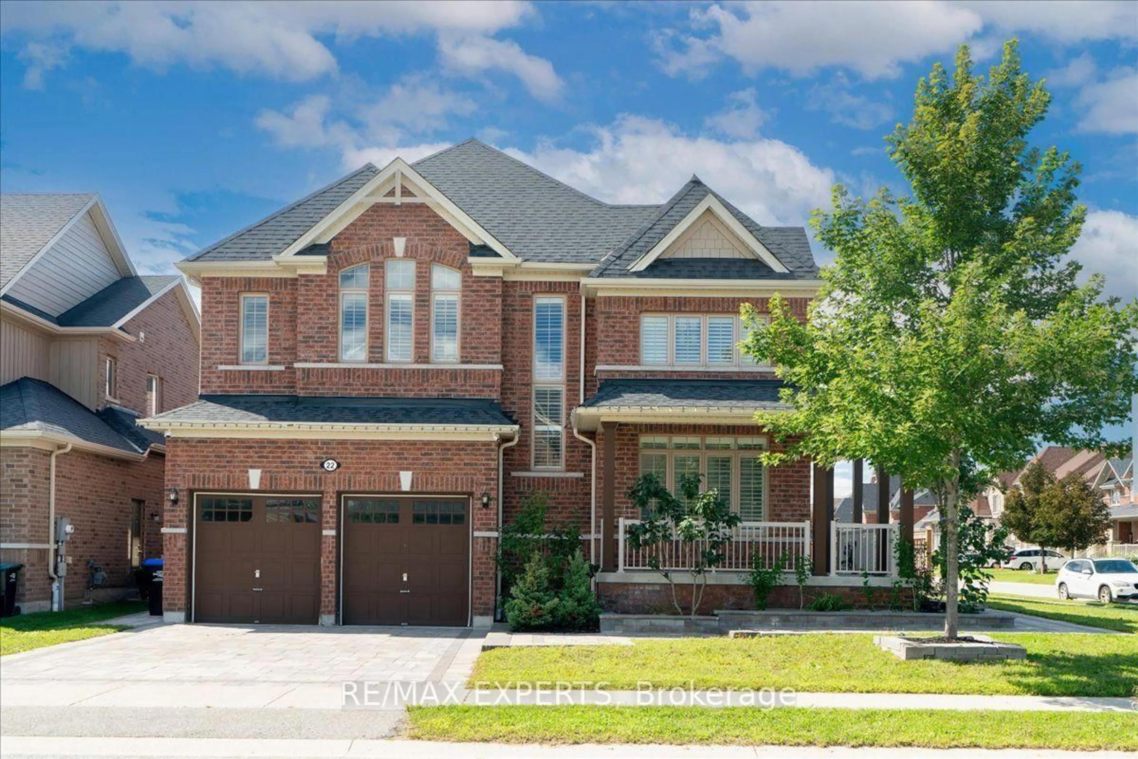 Home with brick exterior material, street for 22 Travers Gate, Springwater Ontario L9X 0S8