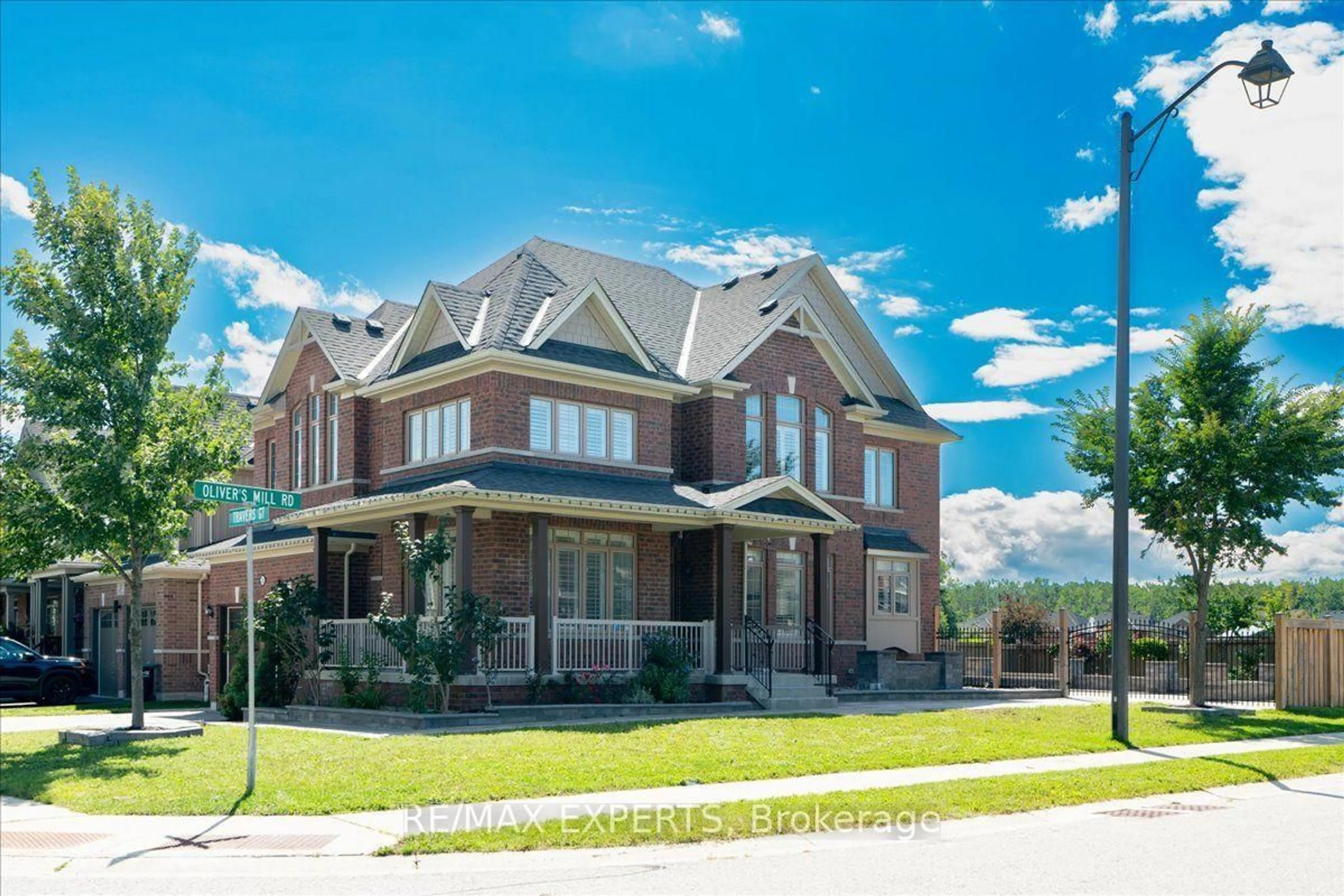 Home with brick exterior material, street for 22 Travers Gate, Springwater Ontario L9X 0S8
