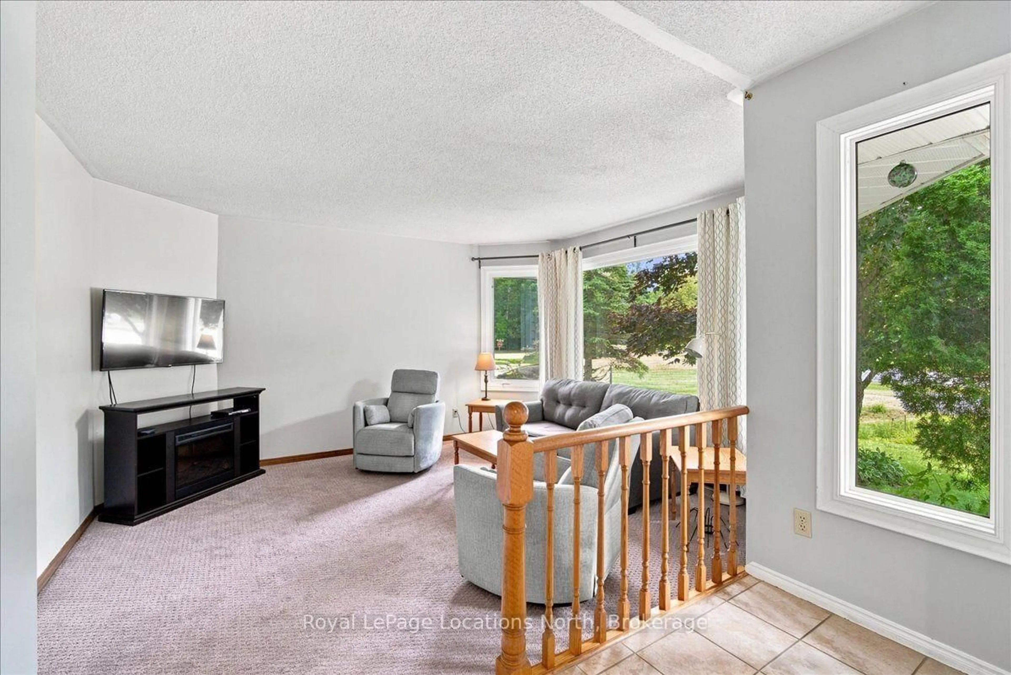 Living room with furniture, unknown for 6 Royal Beech Dr, Wasaga Beach Ontario L9Z 1H1
