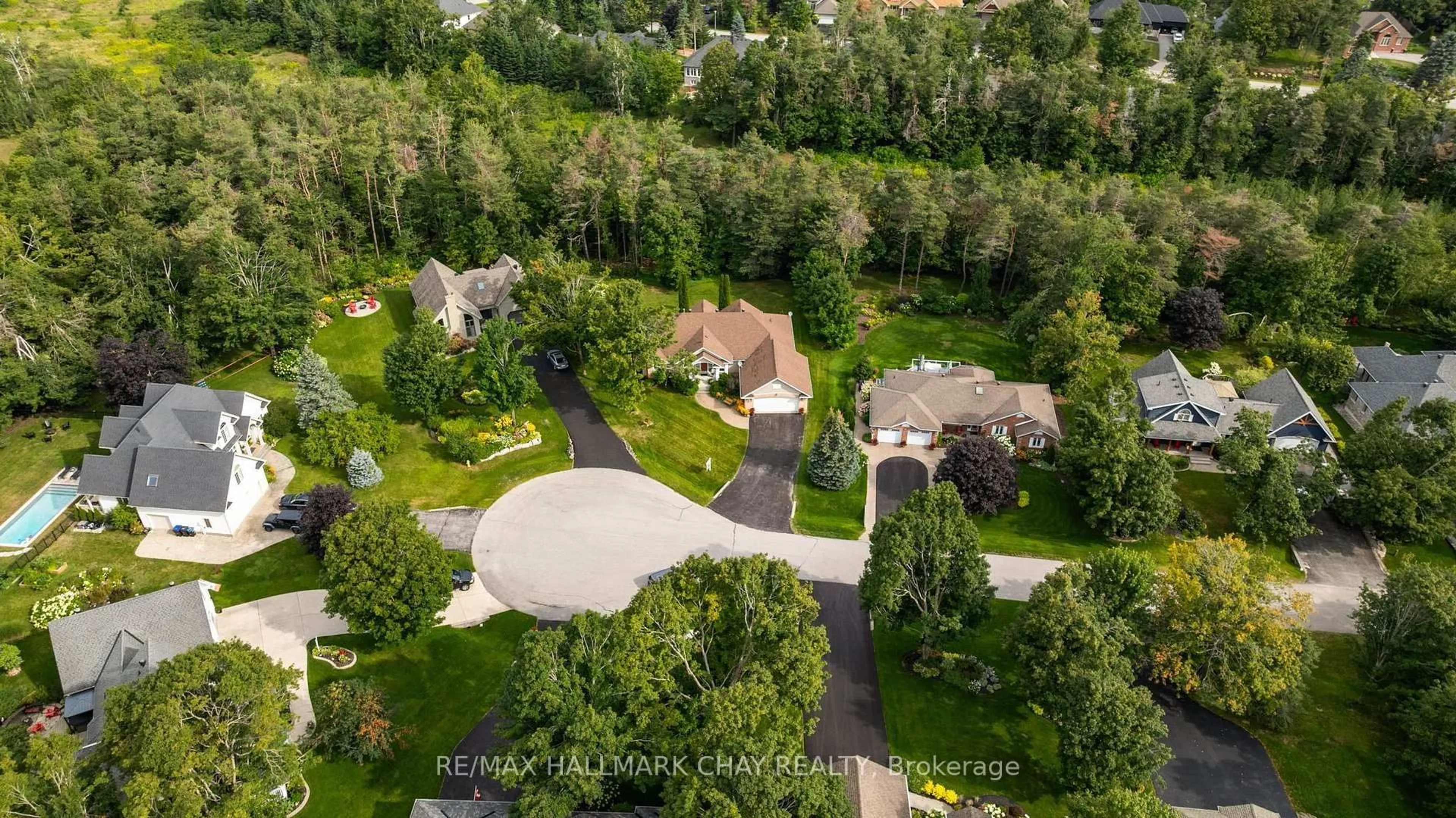 A pic from outside/outdoor area/front of a property/back of a property/a pic from drone, street for 16 Chestnut Lane, Oro-Medonte Ontario L0L 2L0