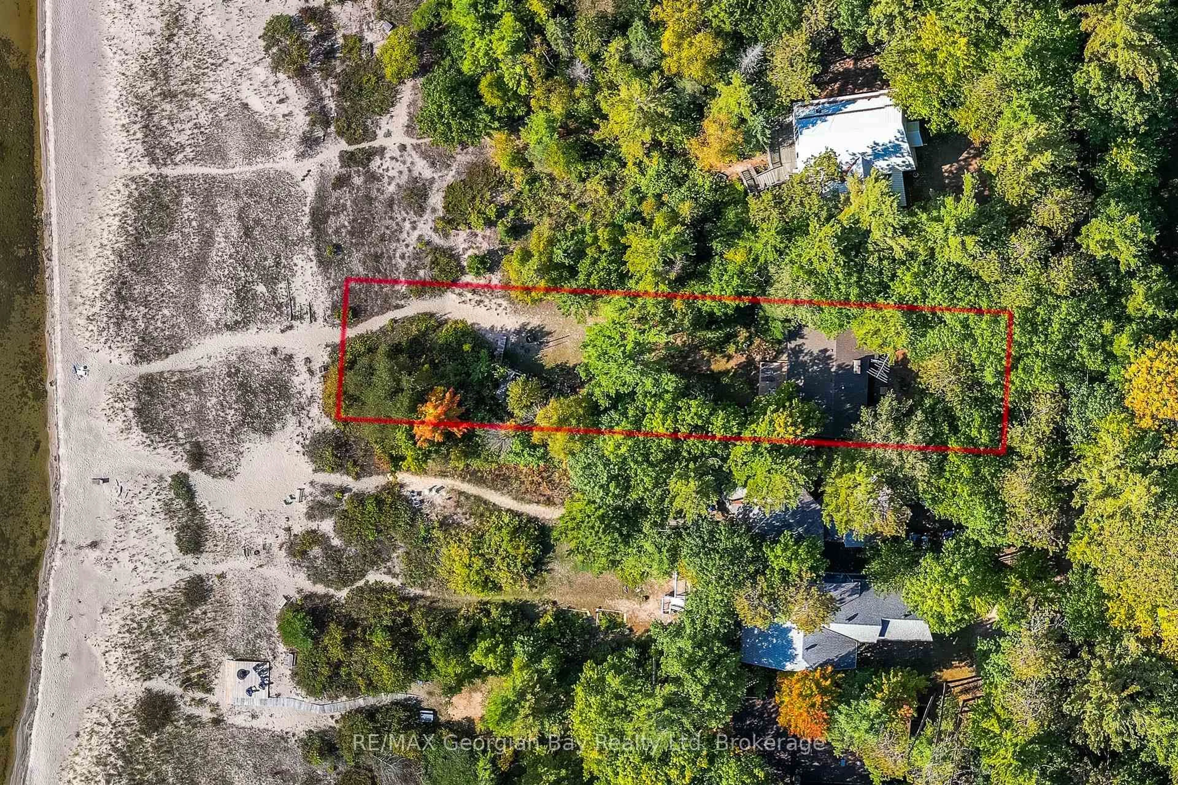 A pic from outside/outdoor area/front of a property/back of a property/a pic from drone, forest/trees view for 100 Nottawaga Dr, Tiny Ontario L0L 2J0