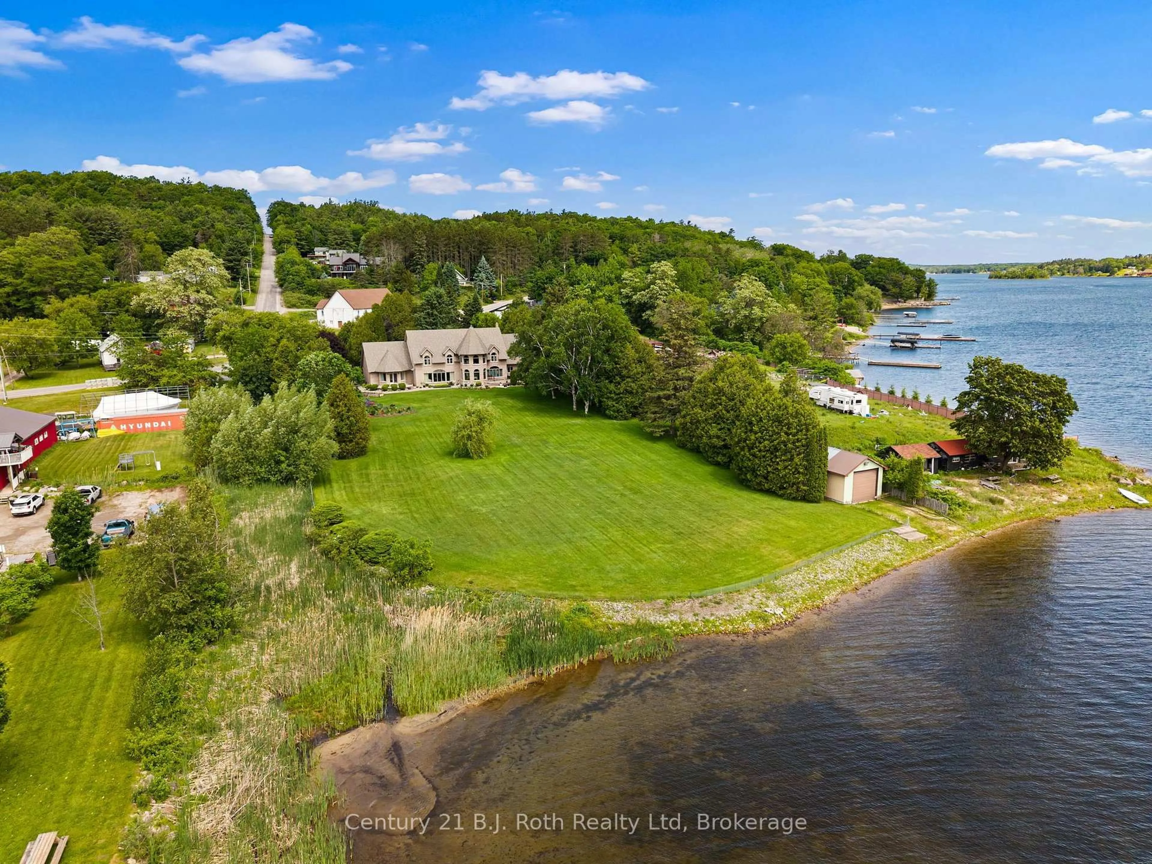 A pic from outside/outdoor area/front of a property/back of a property/a pic from drone, water/lake/river/ocean view for 339 Champlain Rd, Penetanguishene Ontario L9M 1S3