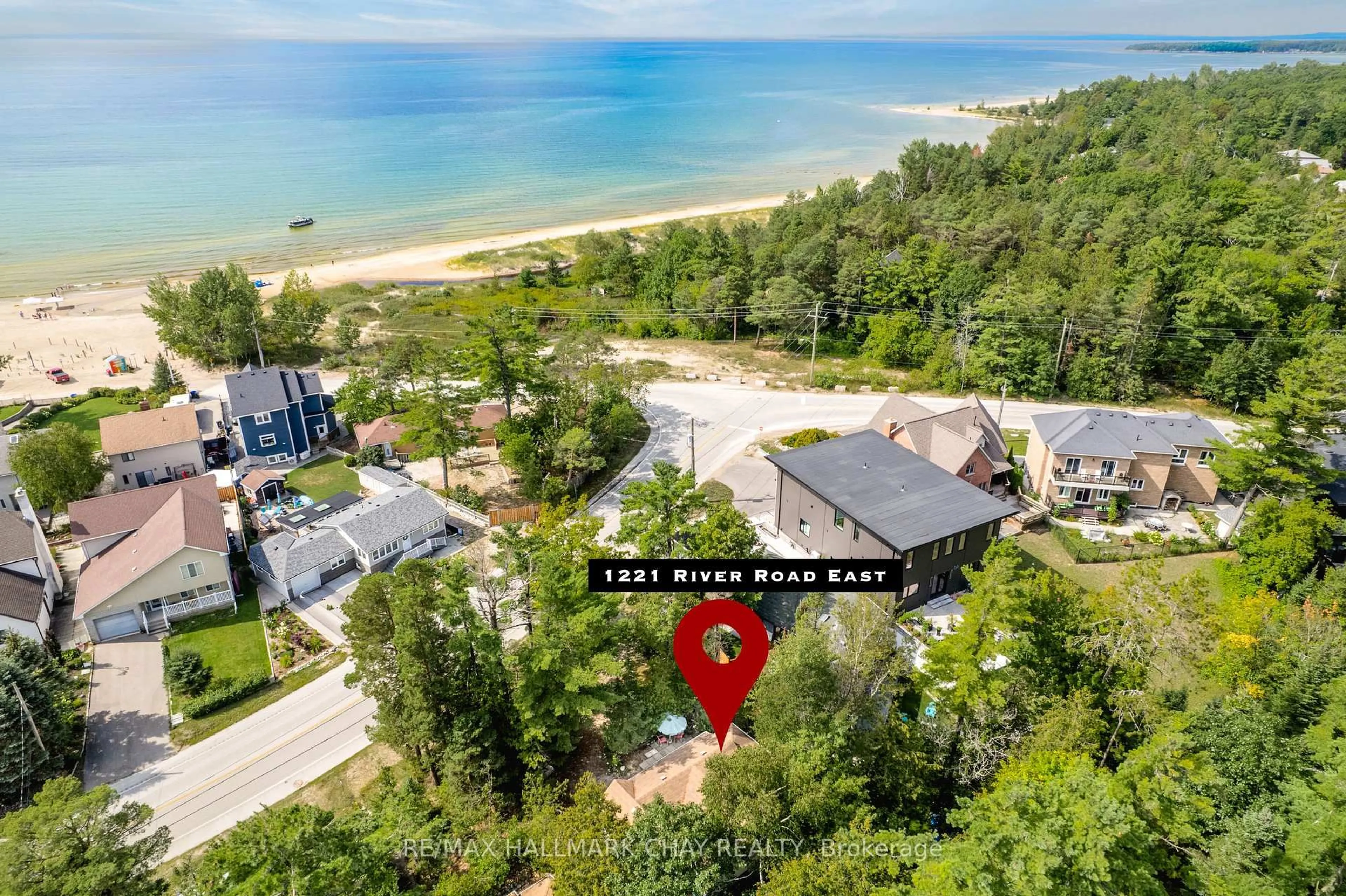 A pic from outside/outdoor area/front of a property/back of a property/a pic from drone, water/lake/river/ocean view for 1221 River Rd, Wasaga Beach Ontario L9Z 2R7