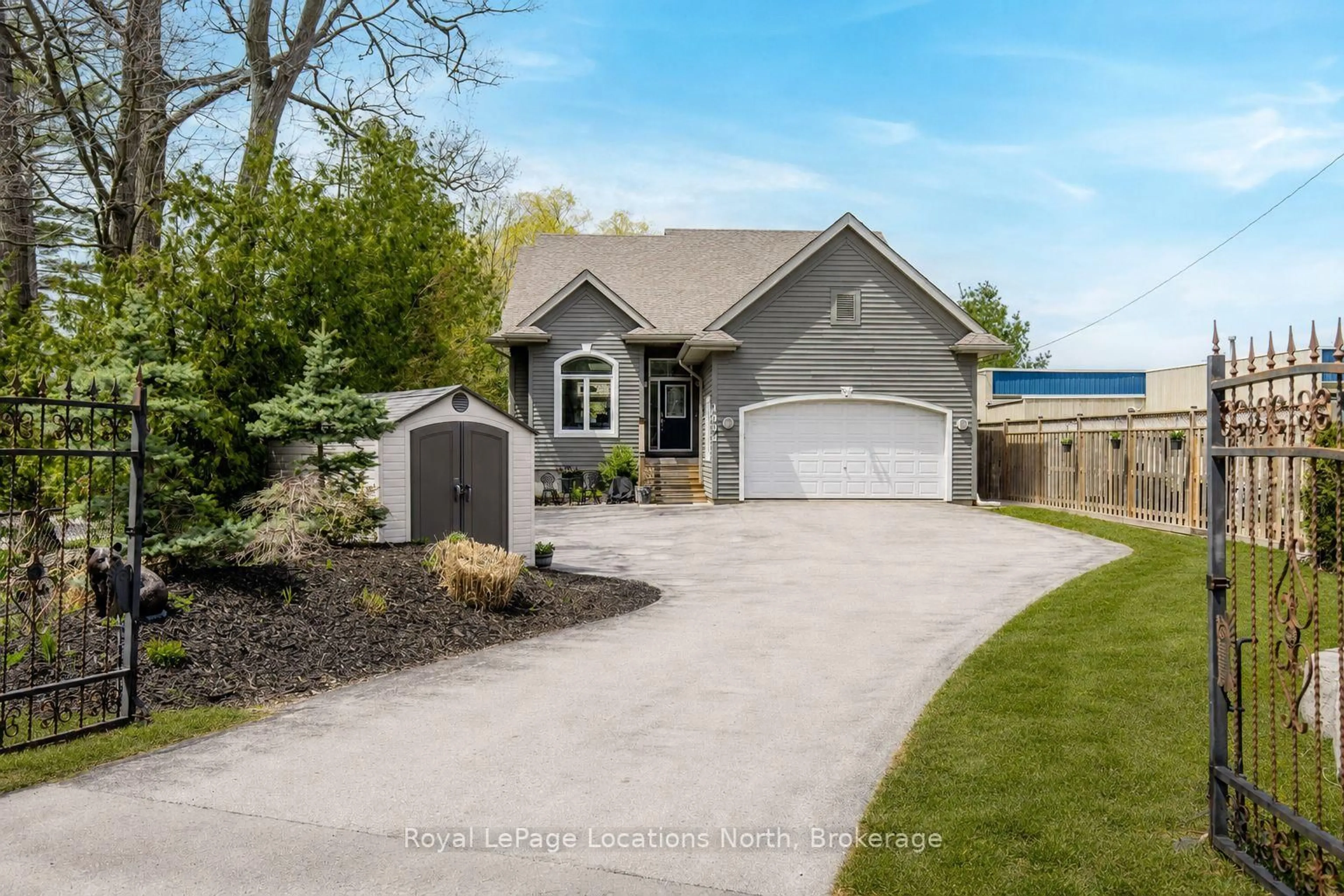 Home with brick exterior material, street for 1094 RIVER Rd, Wasaga Beach Ontario L9Z 2W7