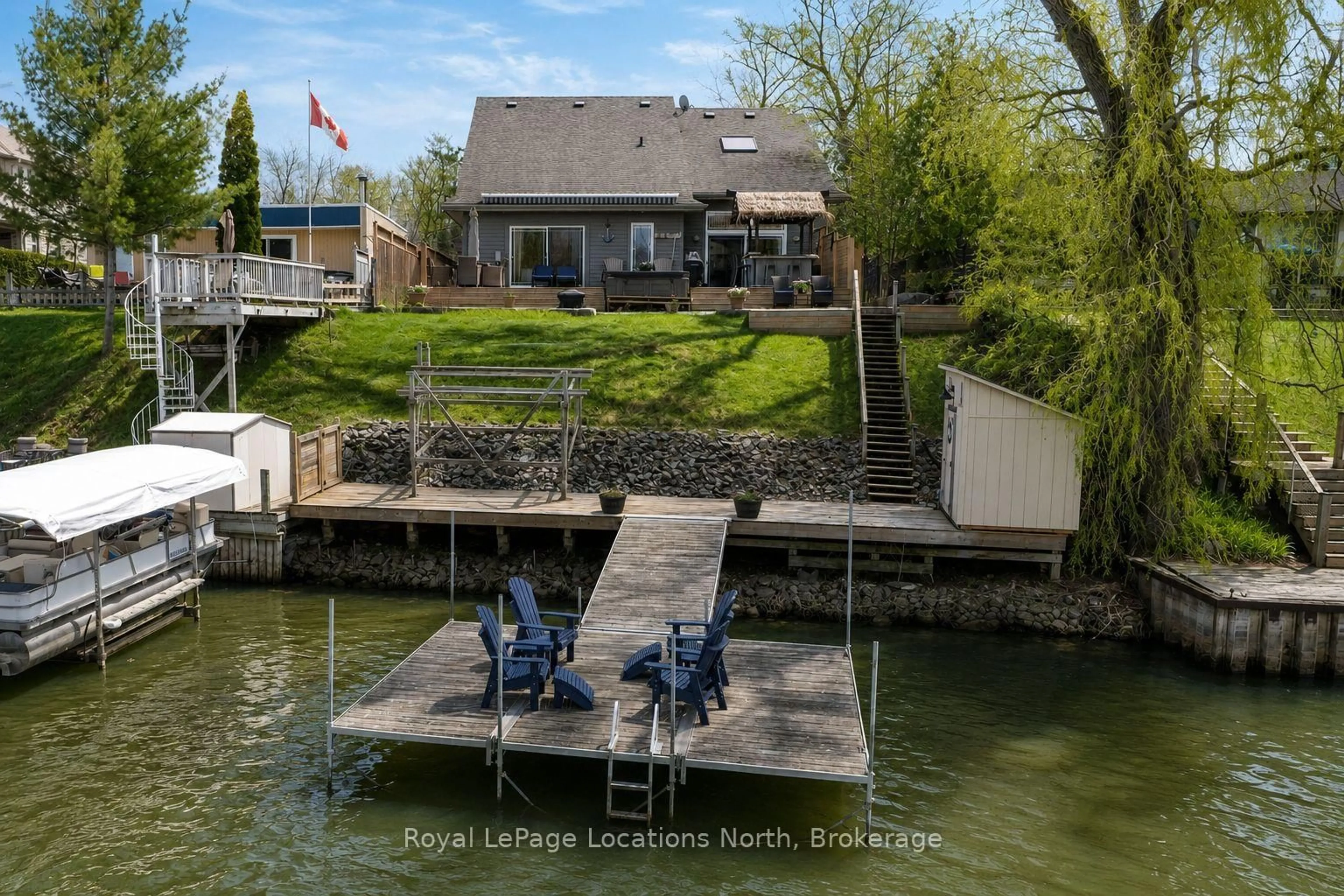 A pic from outside/outdoor area/front of a property/back of a property/a pic from drone, water/lake/river/ocean view for 1094 RIVER Rd, Wasaga Beach Ontario L9Z 2W7