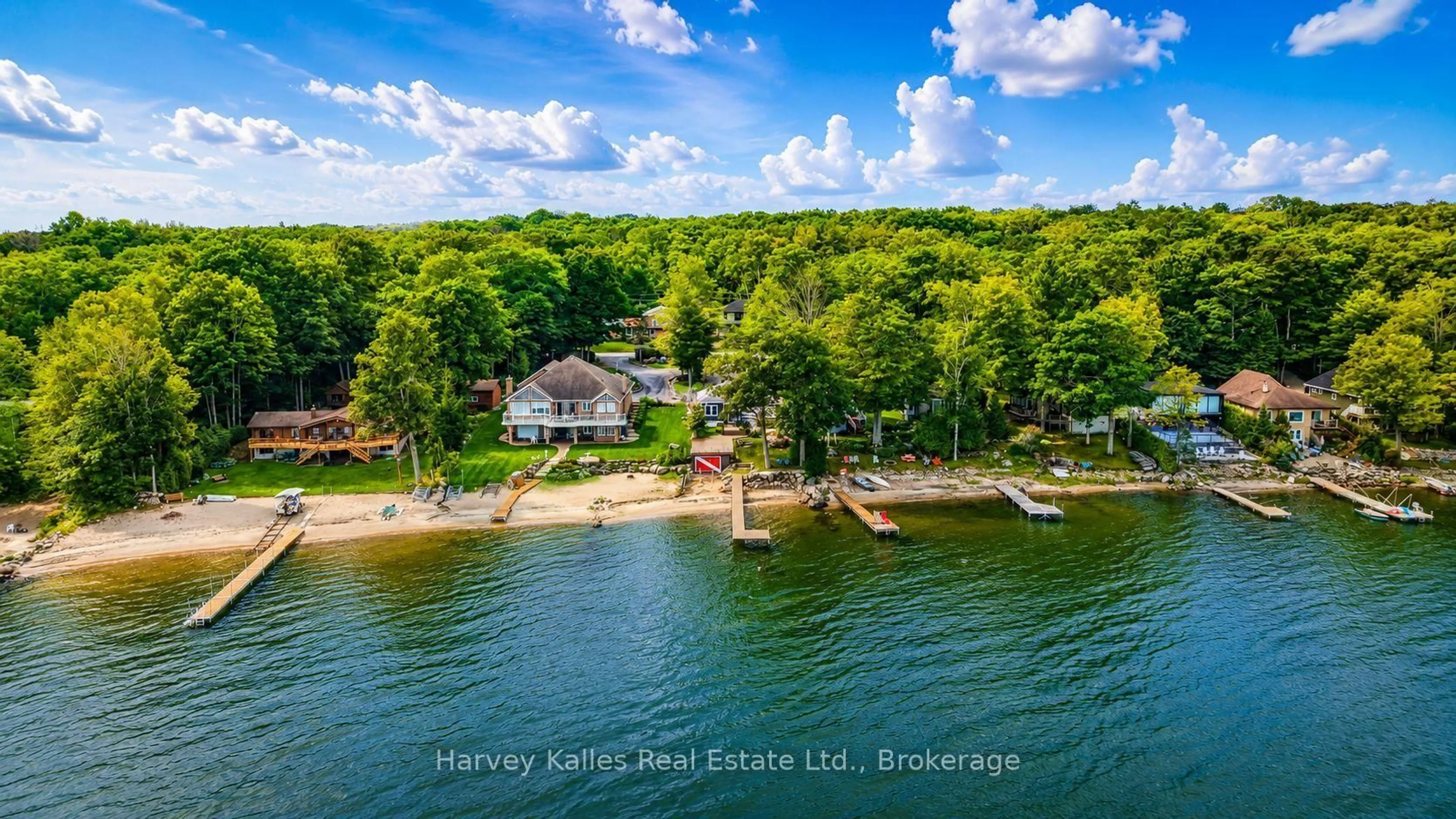 A pic from outside/outdoor area/front of a property/back of a property/a pic from drone, water/lake/river/ocean view for 1515 Champlain Rd, Tiny Ontario L9M 0C1