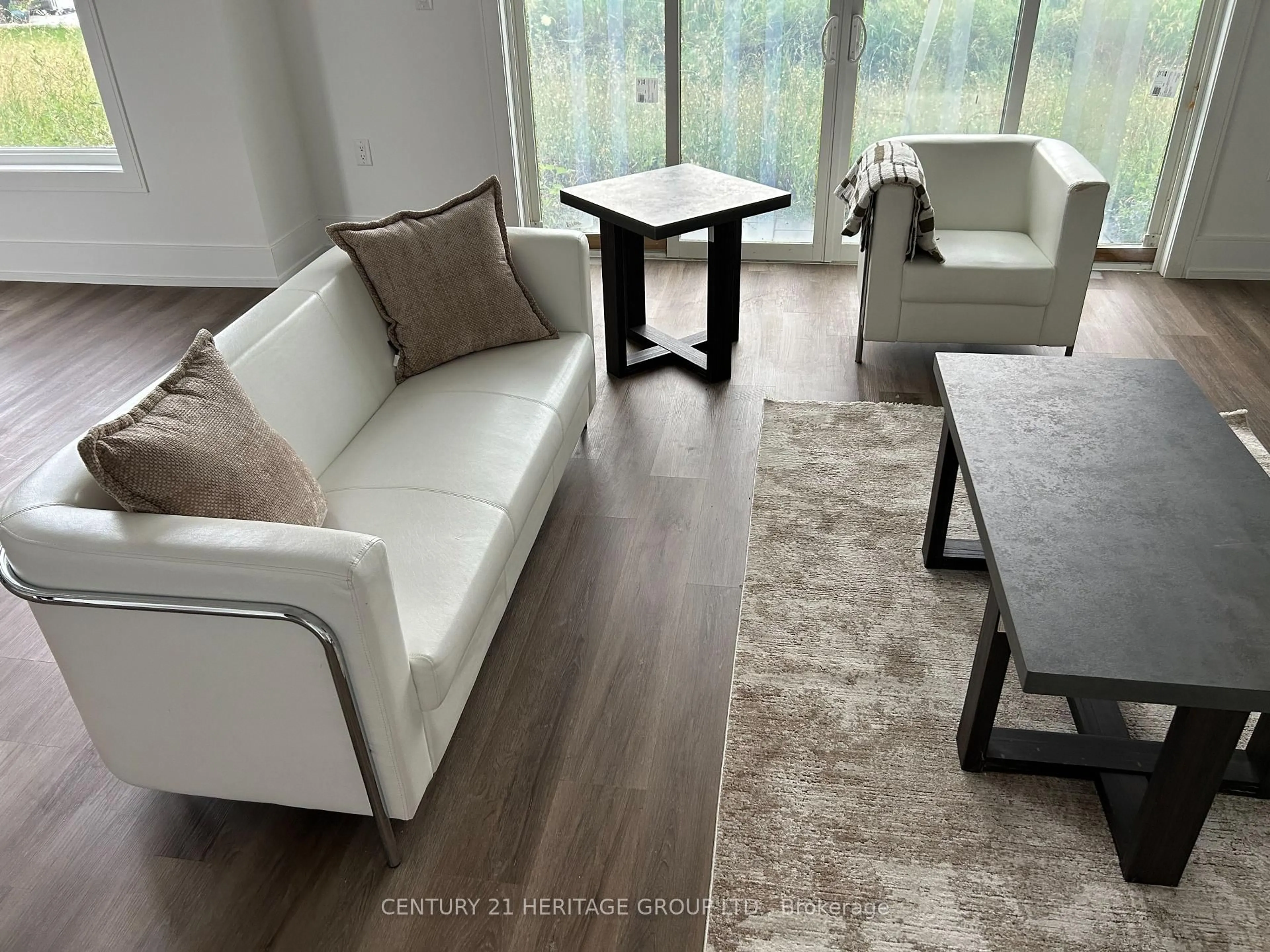Living room with furniture, unknown for 3714 Quayside Dr, Severn Ontario L3V 8M9