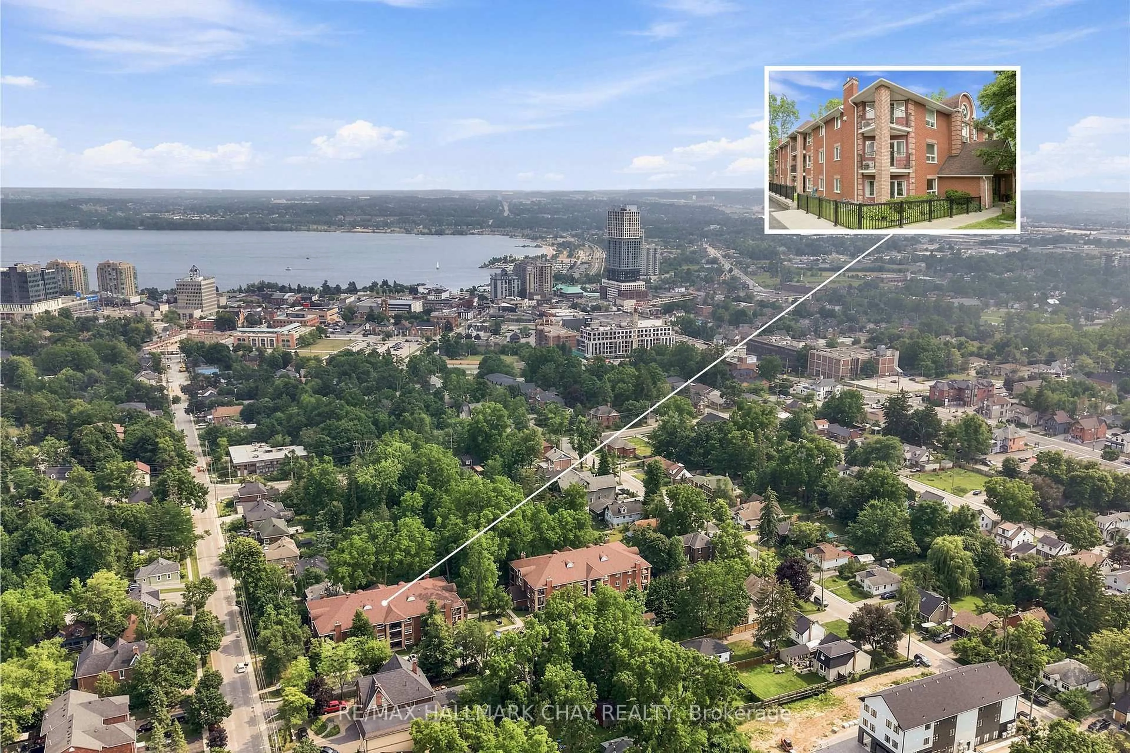 A pic from outside/outdoor area/front of a property/back of a property/a pic from drone, water/lake/river/ocean view for 131 Clapperton St #201, Barrie Ontario L4M 3G3