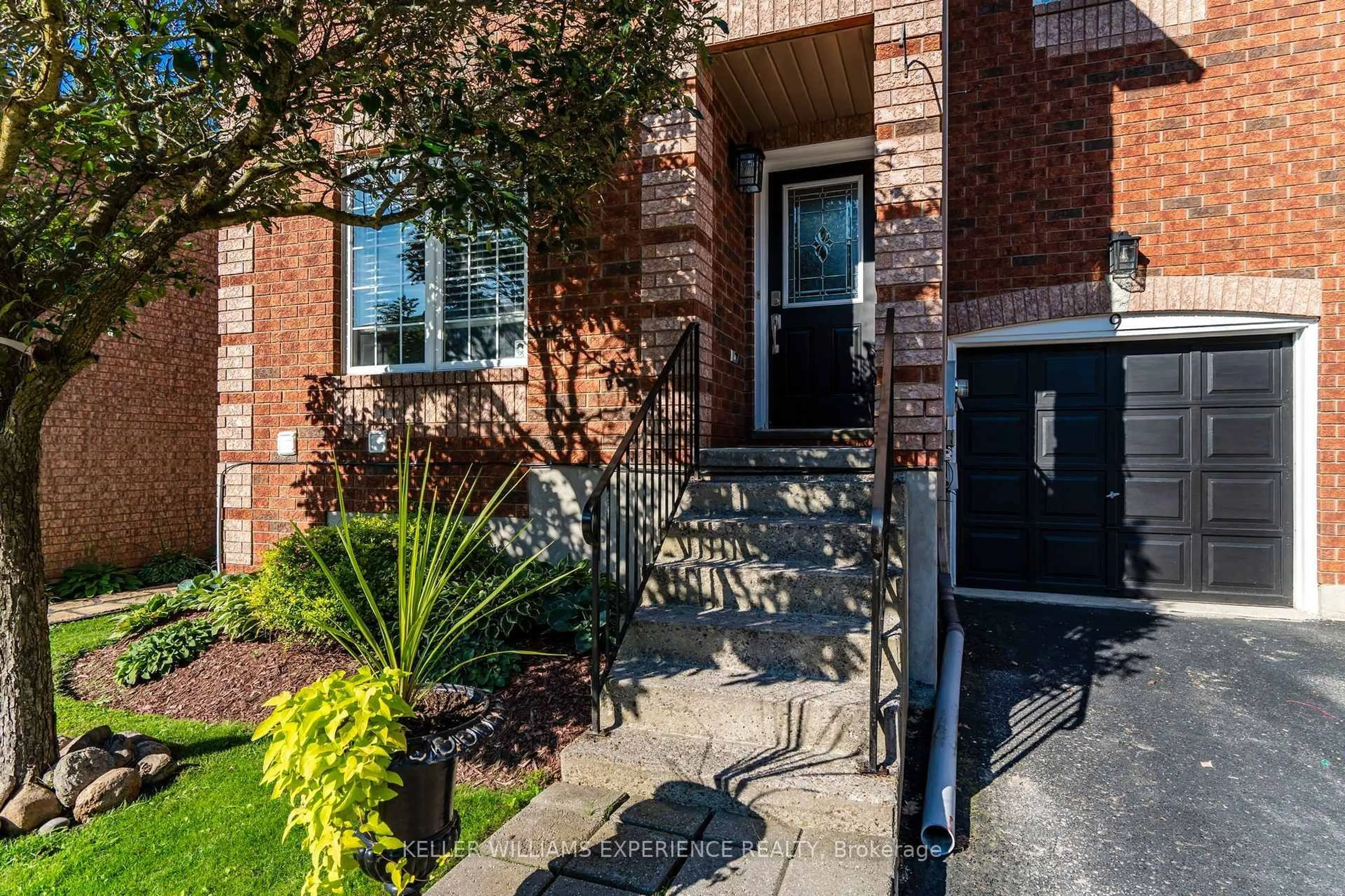 Home with brick exterior material, street for 38 Kenwell Cres #9, Barrie Ontario L4N 0Z6