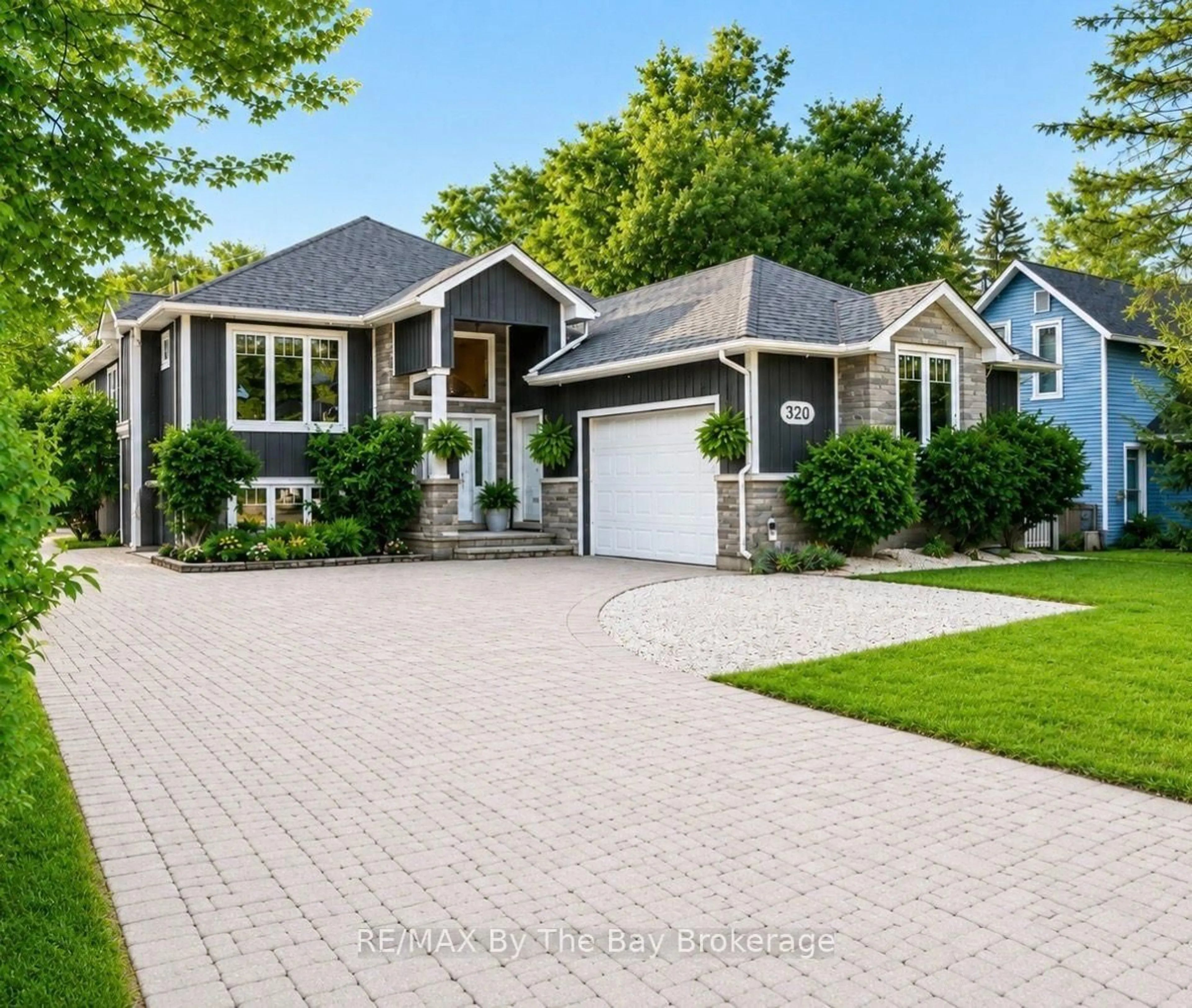 Home with brick exterior material, street for 320 Birch St, Collingwood Ontario L9Y 2V7