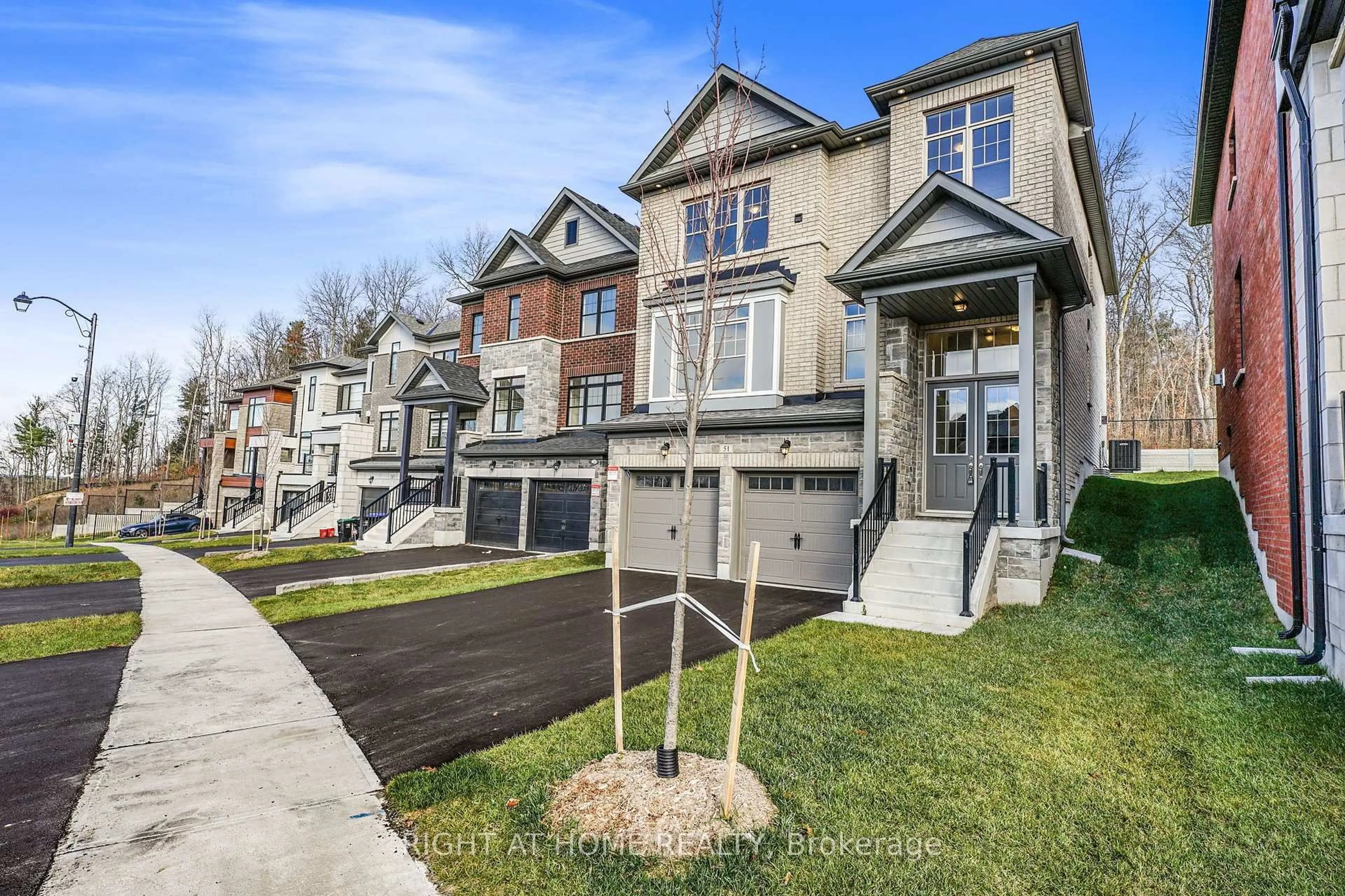 Home with brick exterior material, street for 51 Bearberry Rd, Springwater Ontario L9X 2E1