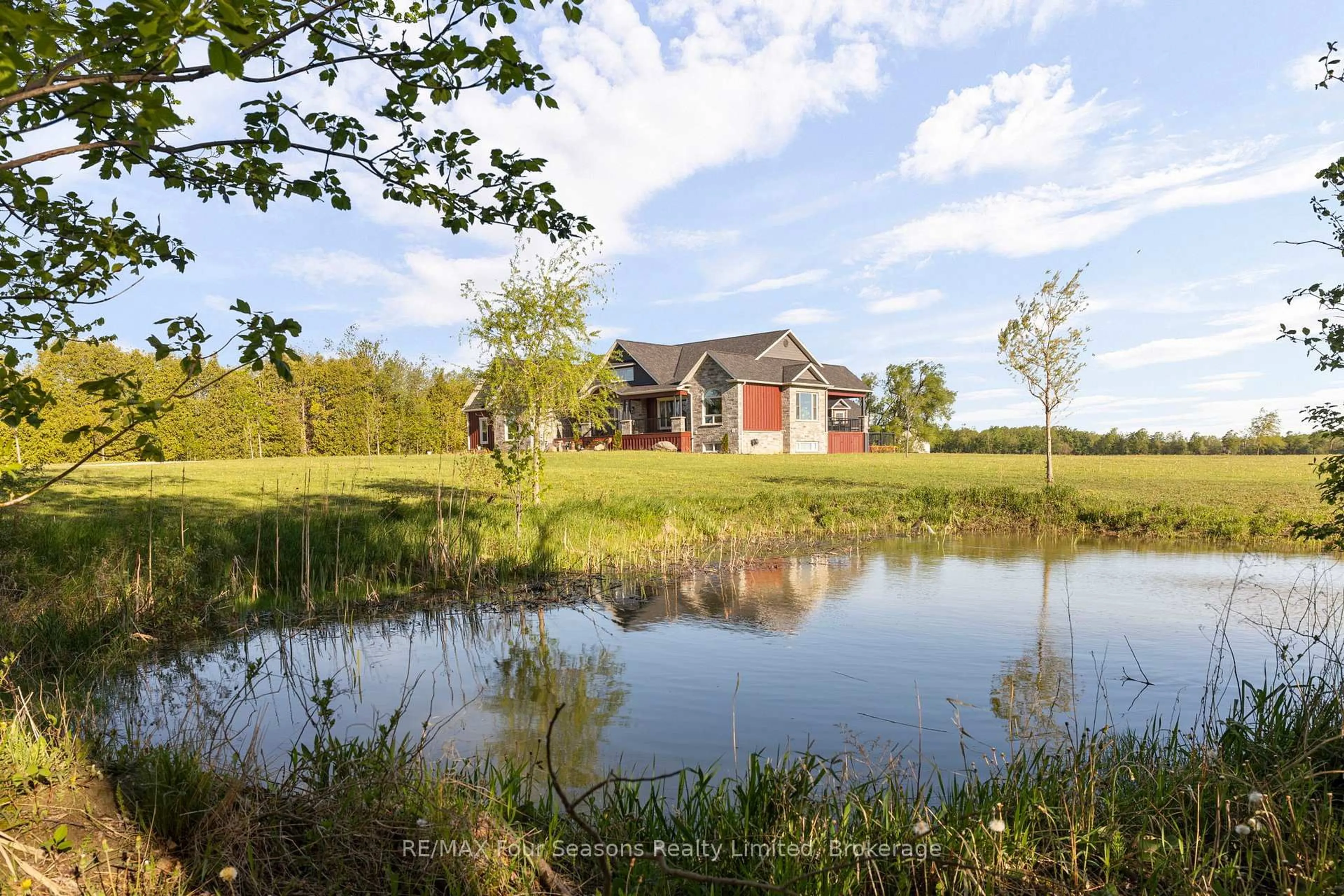 A pic from outside/outdoor area/front of a property/back of a property/a pic from drone, water/lake/river/ocean view for 8672 County Rd 91 Rd, Clearview Ontario L0M 1S0