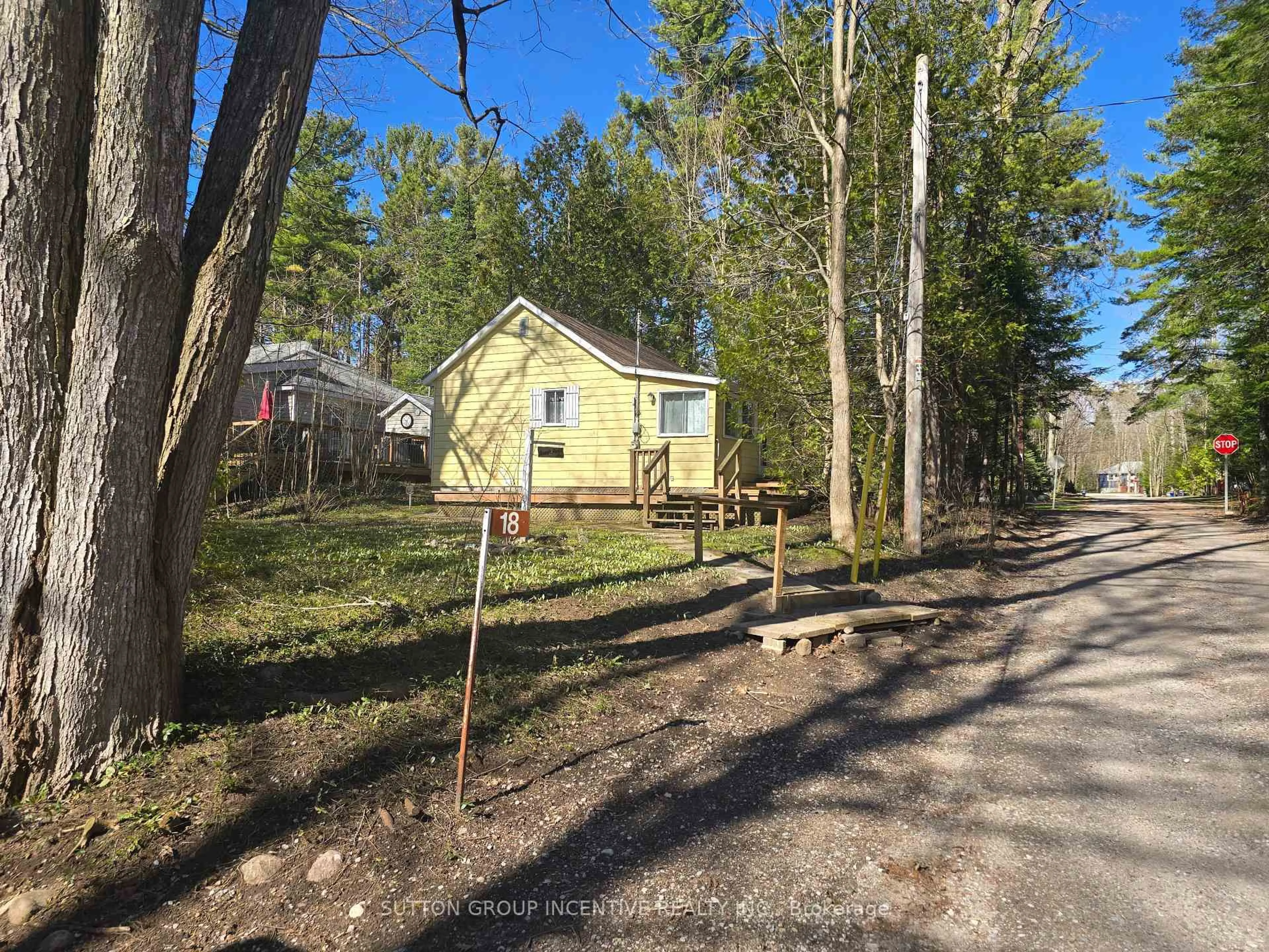 A pic from outside/outdoor area/front of a property/back of a property/a pic from drone, forest/trees view for 18 Harras Ave, Tiny Ontario L0L 2J0