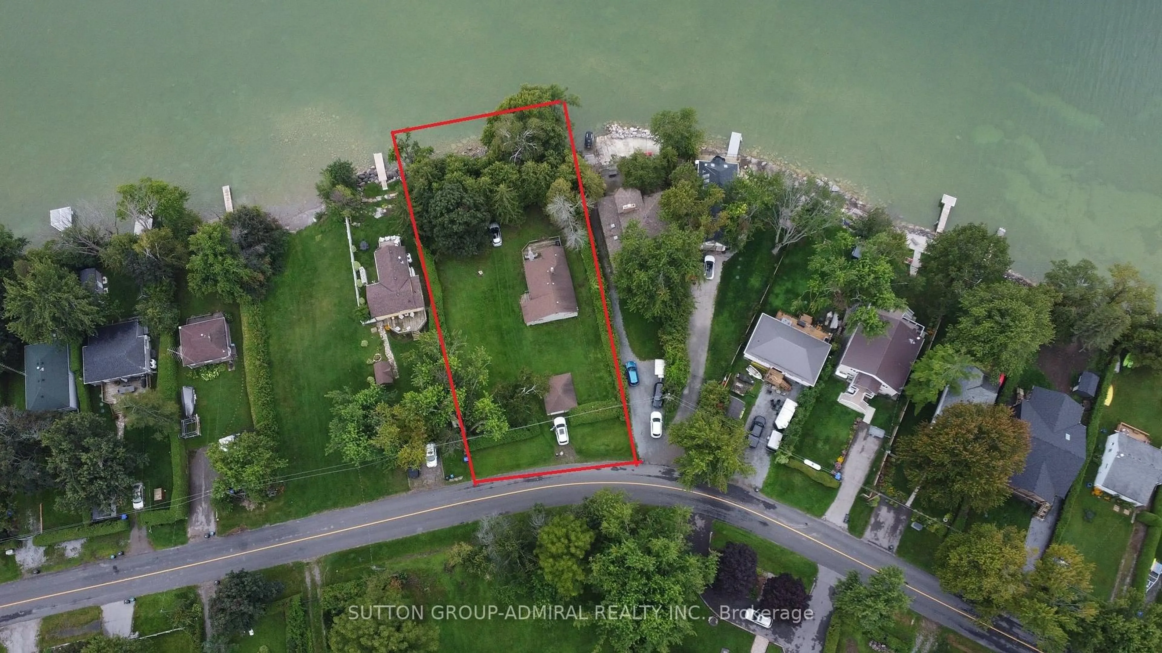 A pic from outside/outdoor area/front of a property/back of a property/a pic from drone, water/lake/river/ocean view for 2392 Lakeshore Dr, Ramara Ontario L0K 1B0