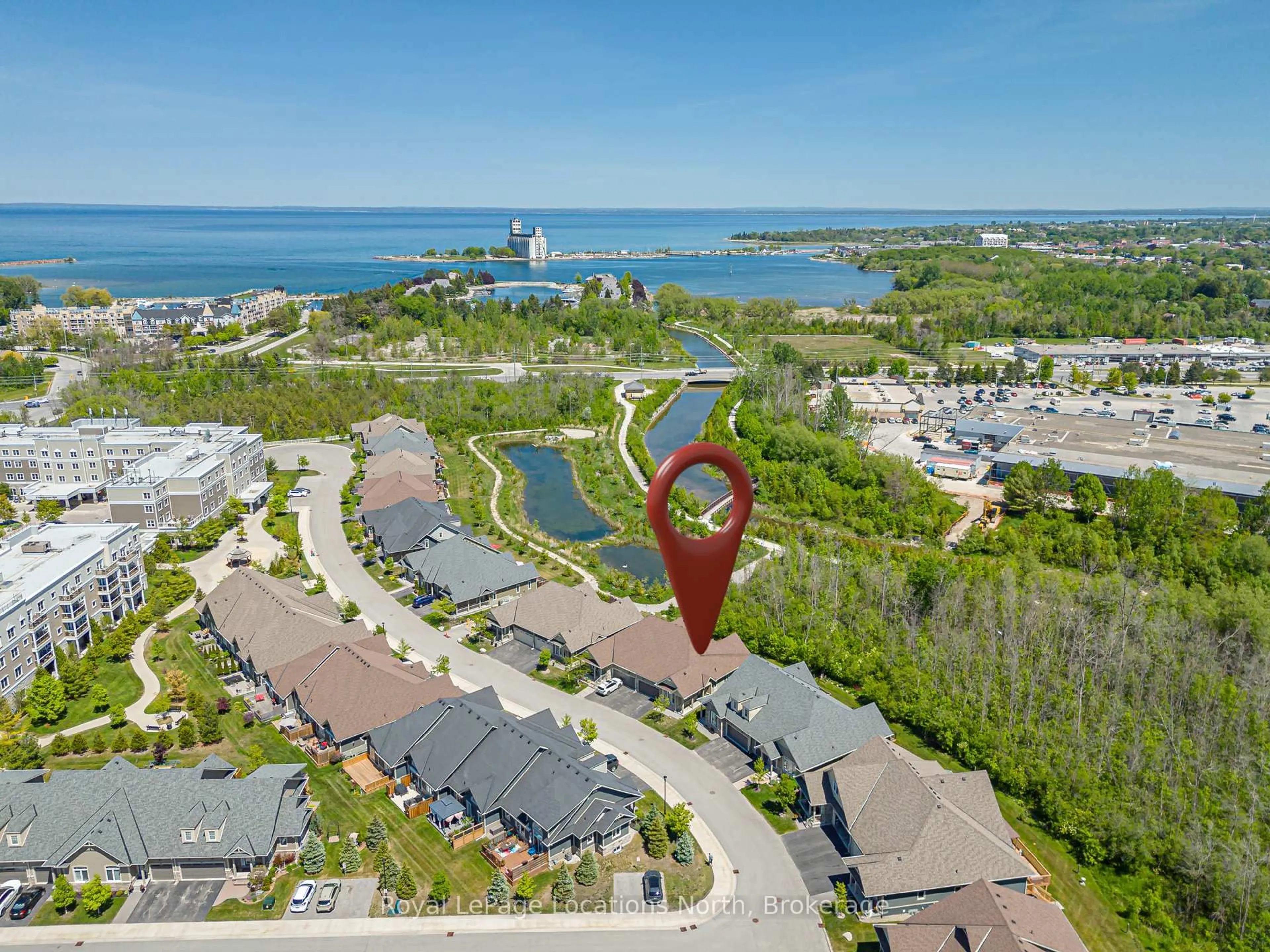 A pic from outside/outdoor area/front of a property/back of a property/a pic from drone, water/lake/river/ocean view for 68 Kari Cres, Collingwood Ontario L9Y 0Z7