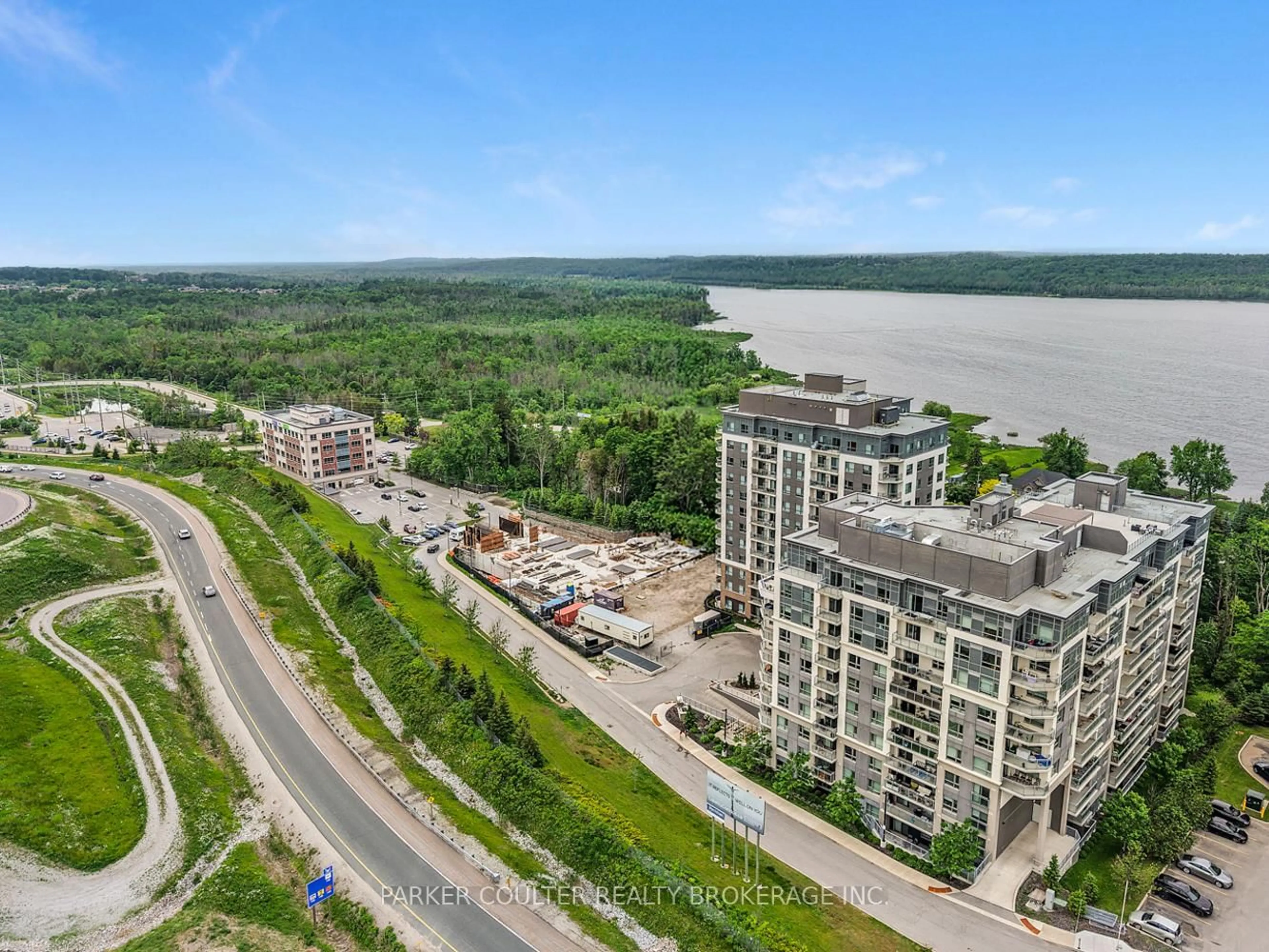 A pic from outside/outdoor area/front of a property/back of a property/a pic from drone, water/lake/river/ocean view for 58 Lakeside Terr #909, Barrie Ontario L4M 0L5