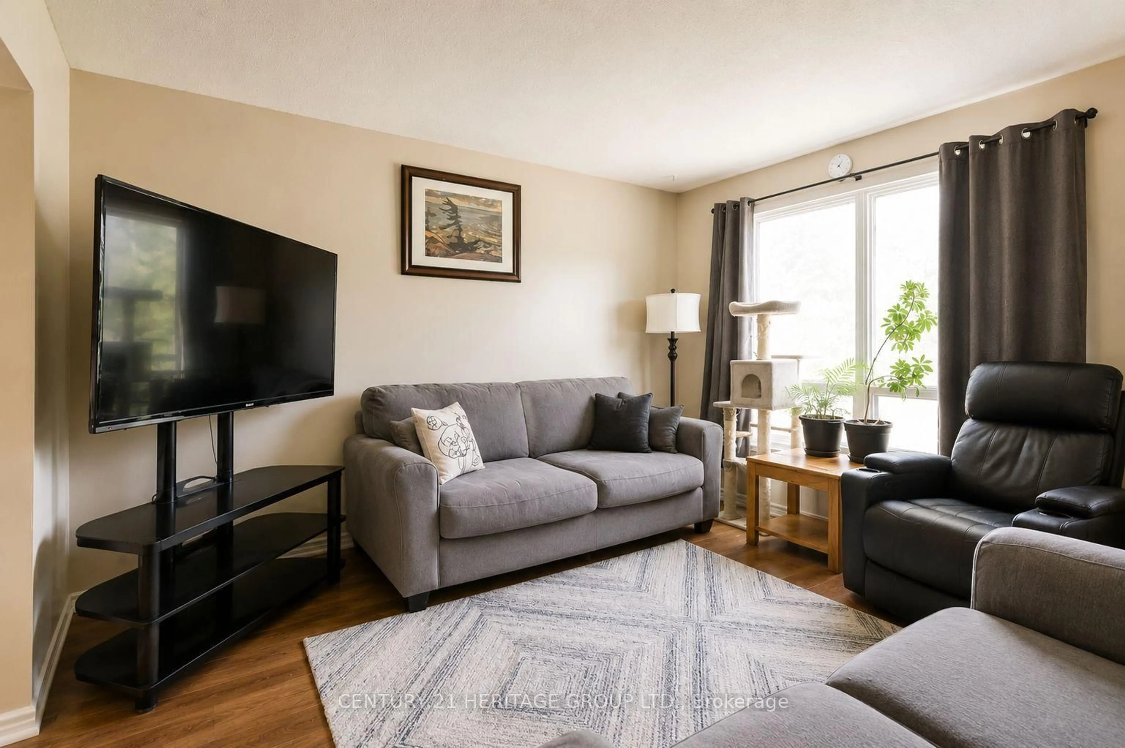 Living room with furniture, unknown for 85 Chaucer Cres, Barrie Ontario L4N 4T8