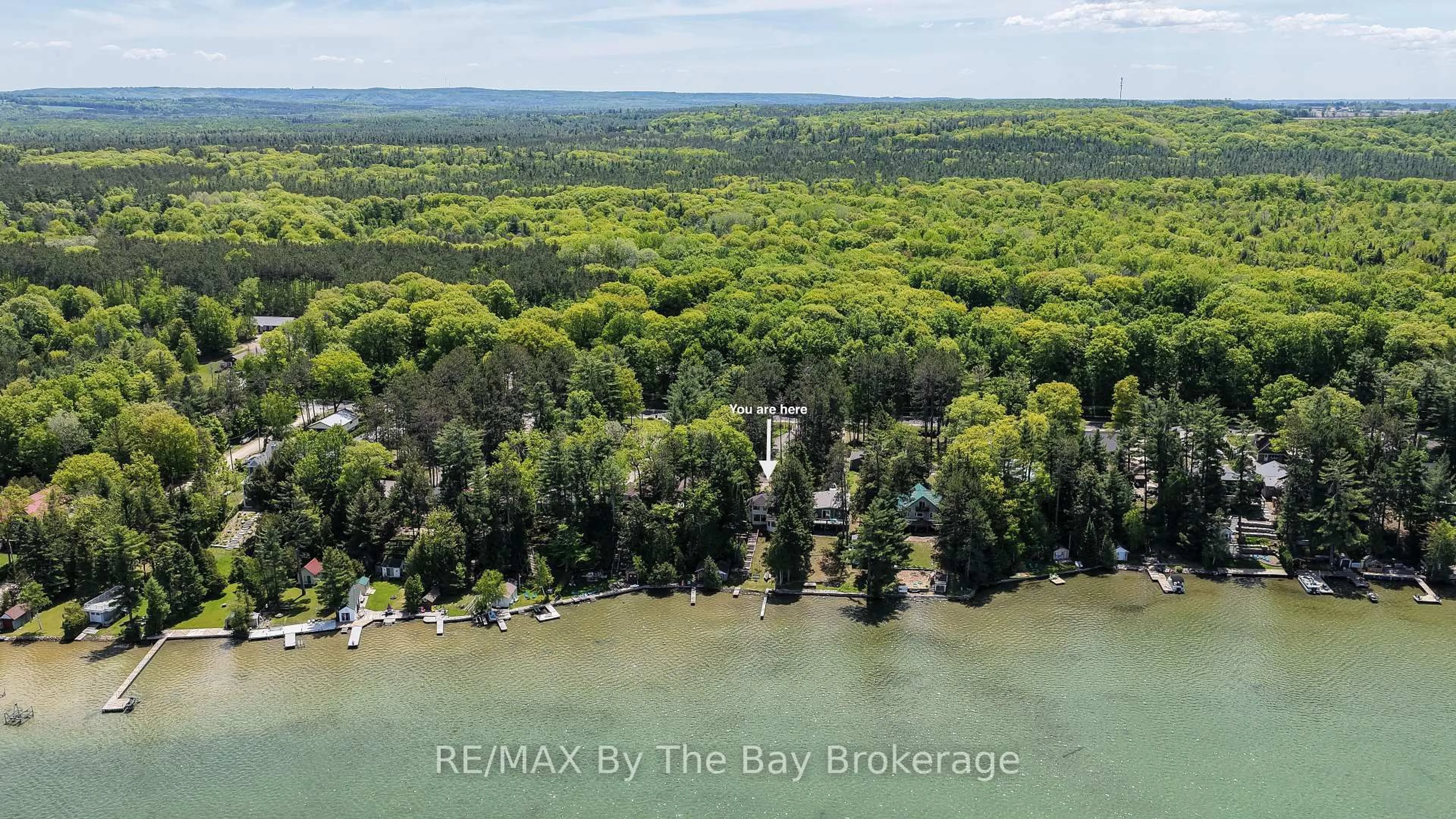 A pic from outside/outdoor area/front of a property/back of a property/a pic from drone, water/lake/river/ocean view for 2284 South Orr Lake Rd, Springwater Ontario L0L 1P0
