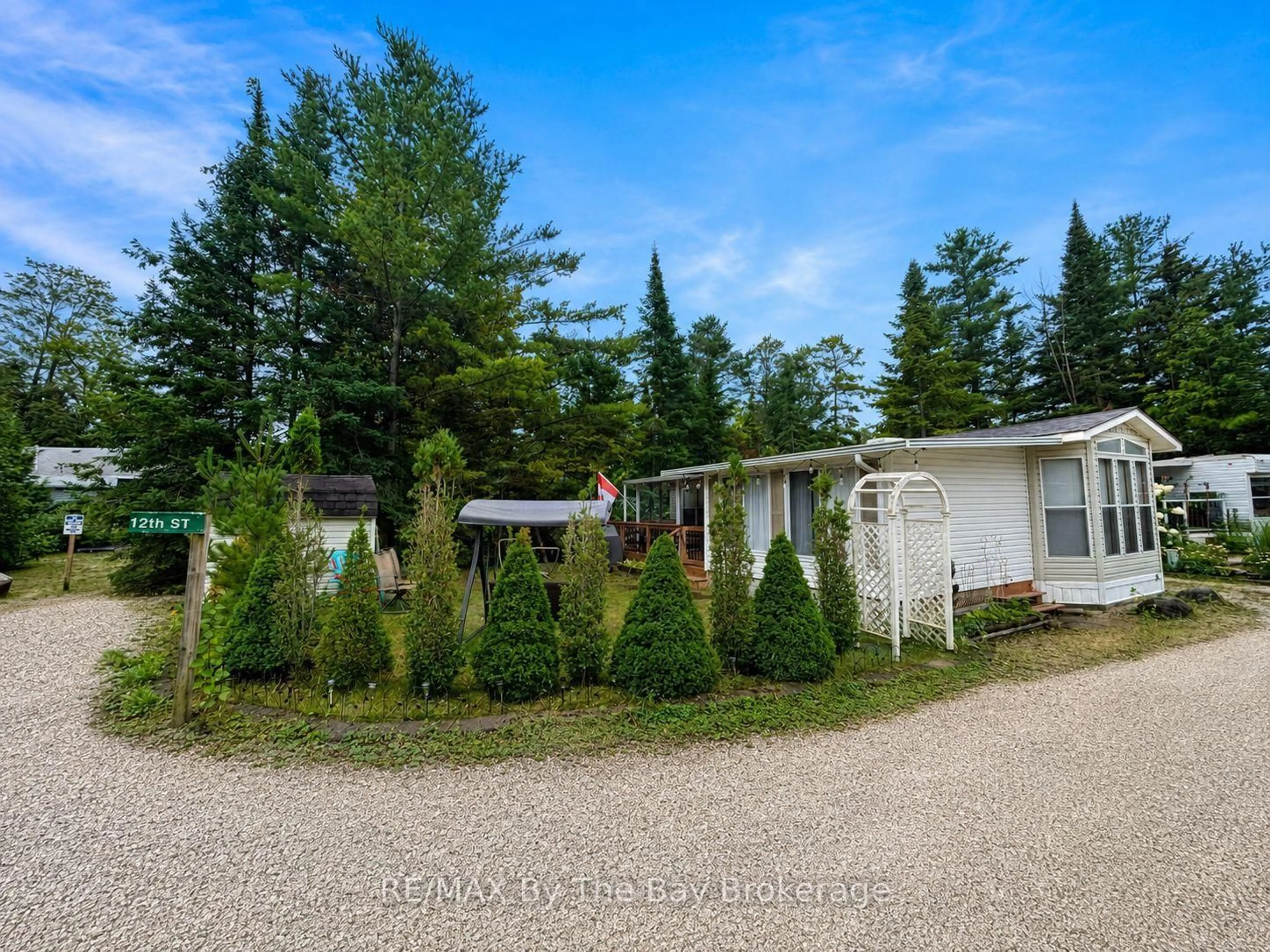A pic from outside/outdoor area/front of a property/back of a property/a pic from drone, unknown for 85 THEME PARK Dr #168, Wasaga Beach Ontario L9Z 1X7