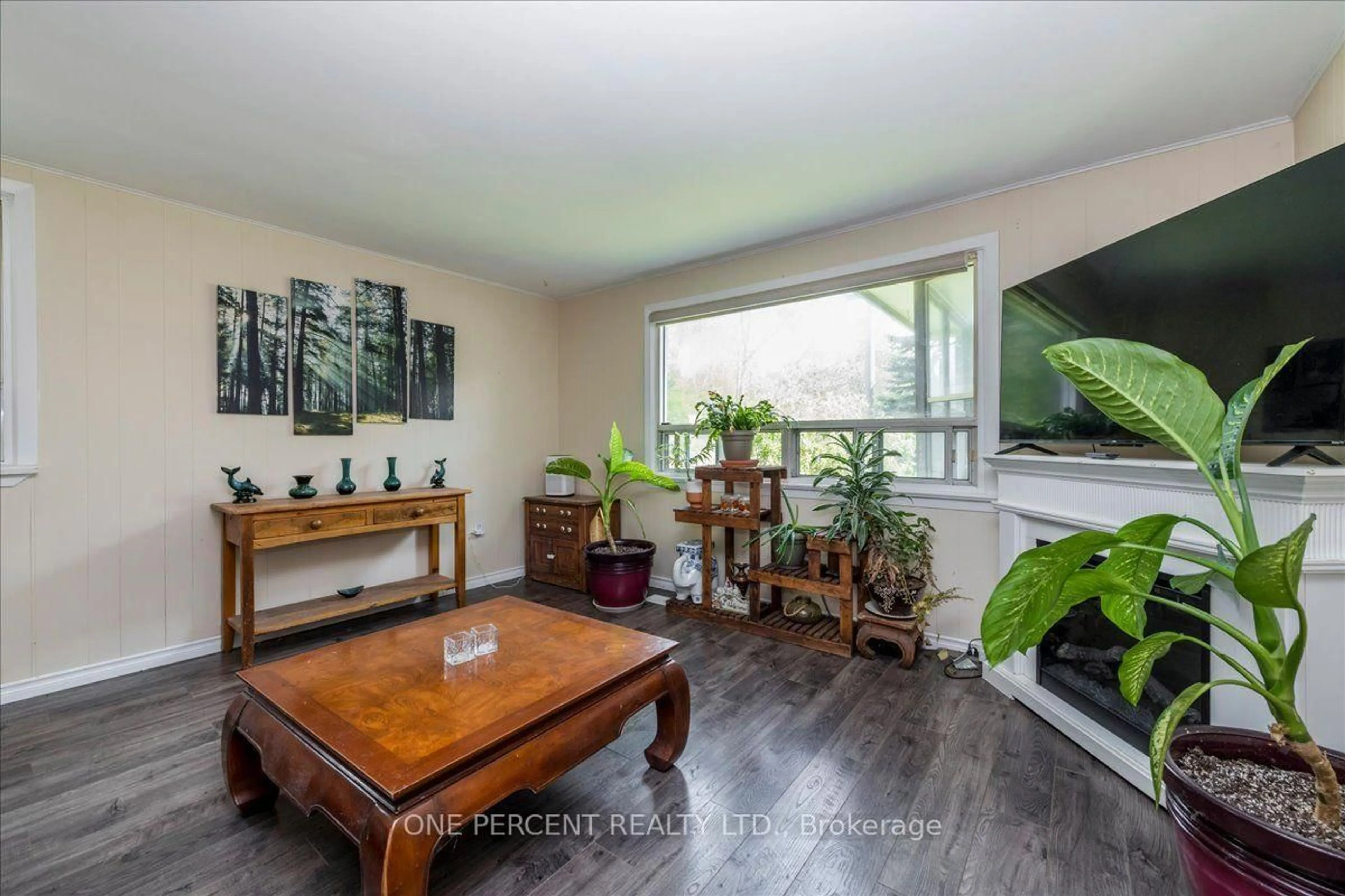 Living room with furniture, wood/laminate floor for 224 Foster Dr, Barrie Ontario L4N 3X8