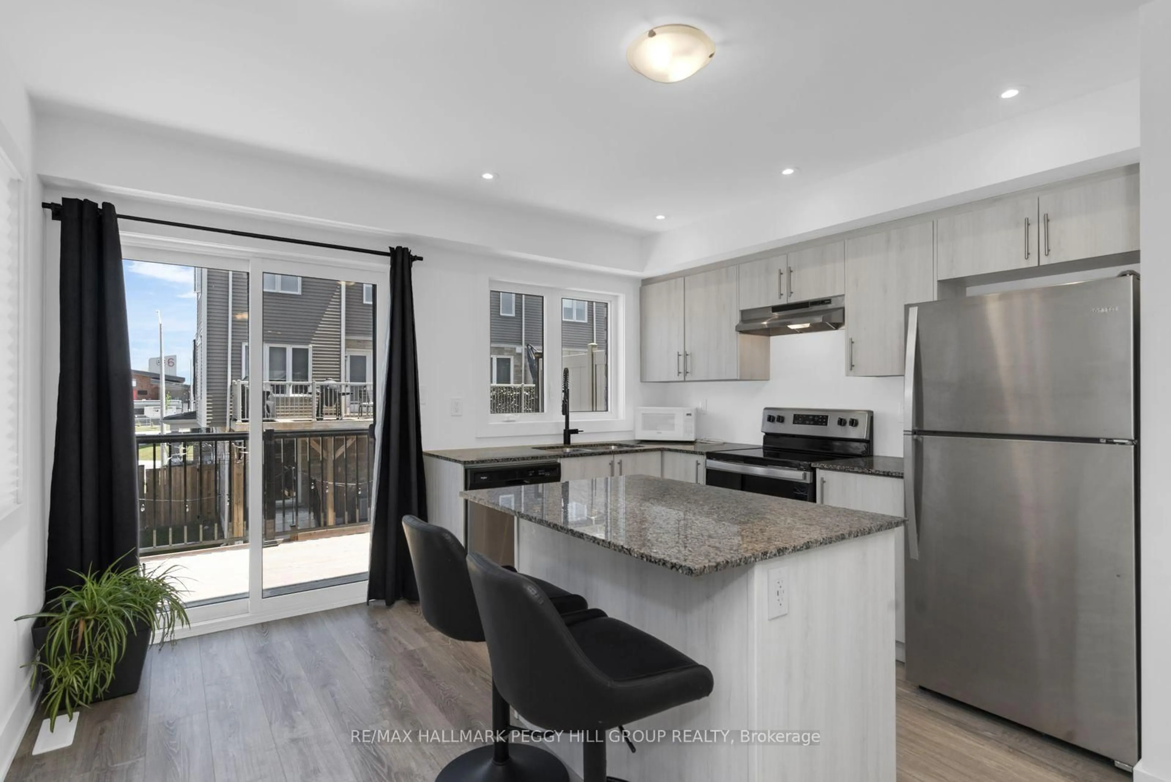 Open concept kitchen, unknown for 30 Pumpkin Corner Cres, Barrie Ontario L9J 0T6
