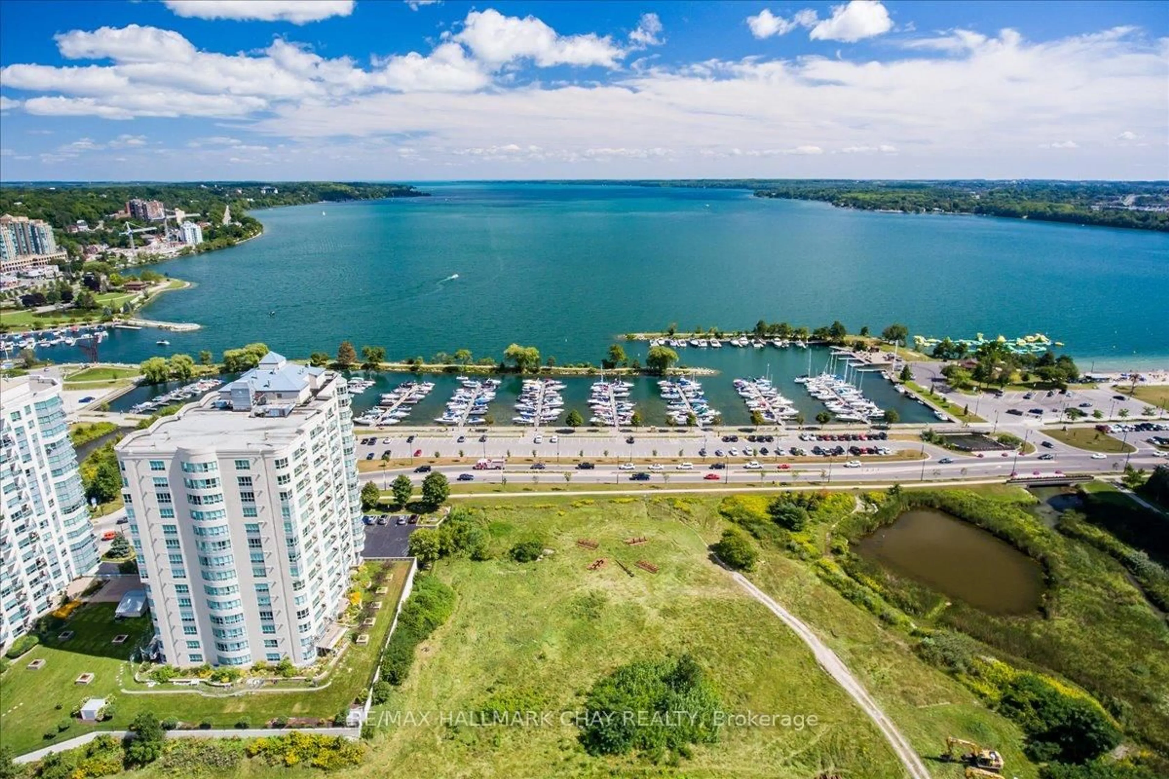 A pic from outside/outdoor area/front of a property/back of a property/a pic from drone, water/lake/river/ocean view for 2 Toronto St #1411, Barrie Ontario L4N 9R2