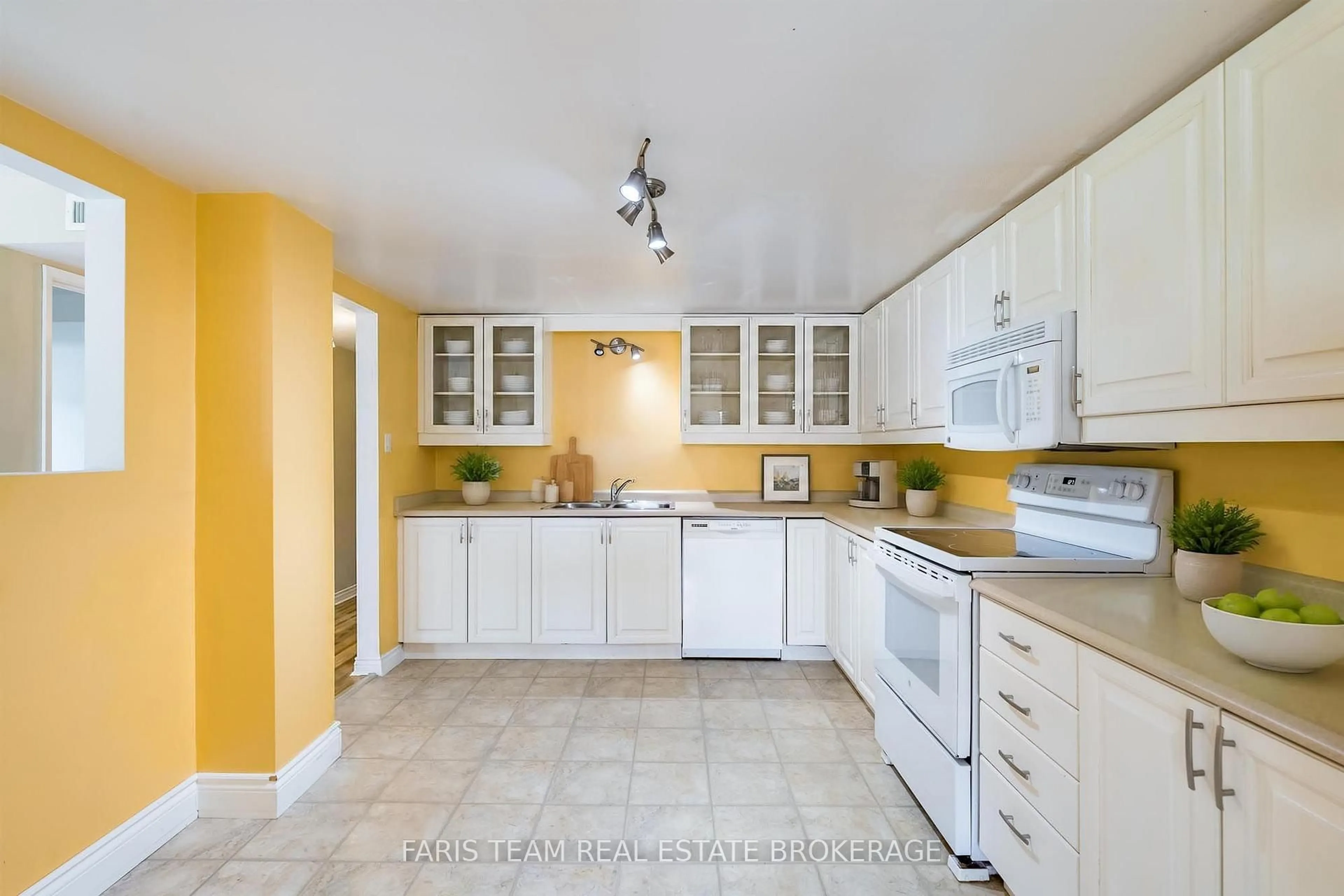 Standard kitchen, ceramic/tile floor for 95 Matchedash St #202, Orillia Ontario L3V 4T9