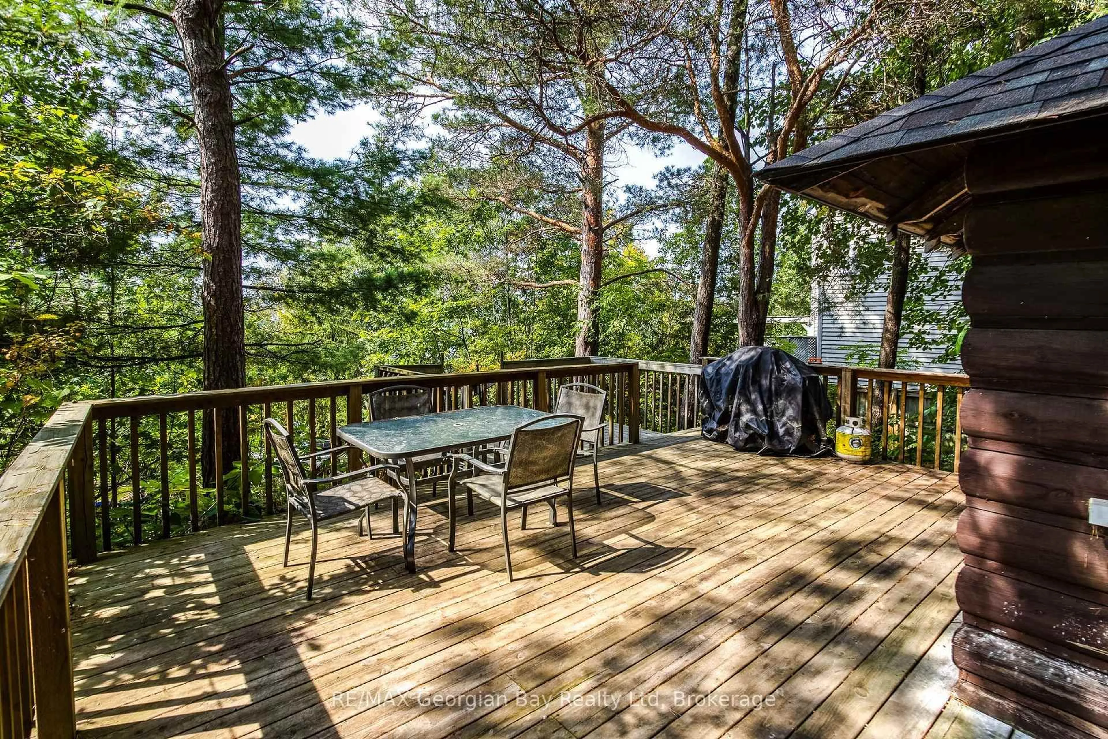 Patio, forest/trees view for 68 Tiny Beaches Rd, Tiny Ontario L0L 2J0