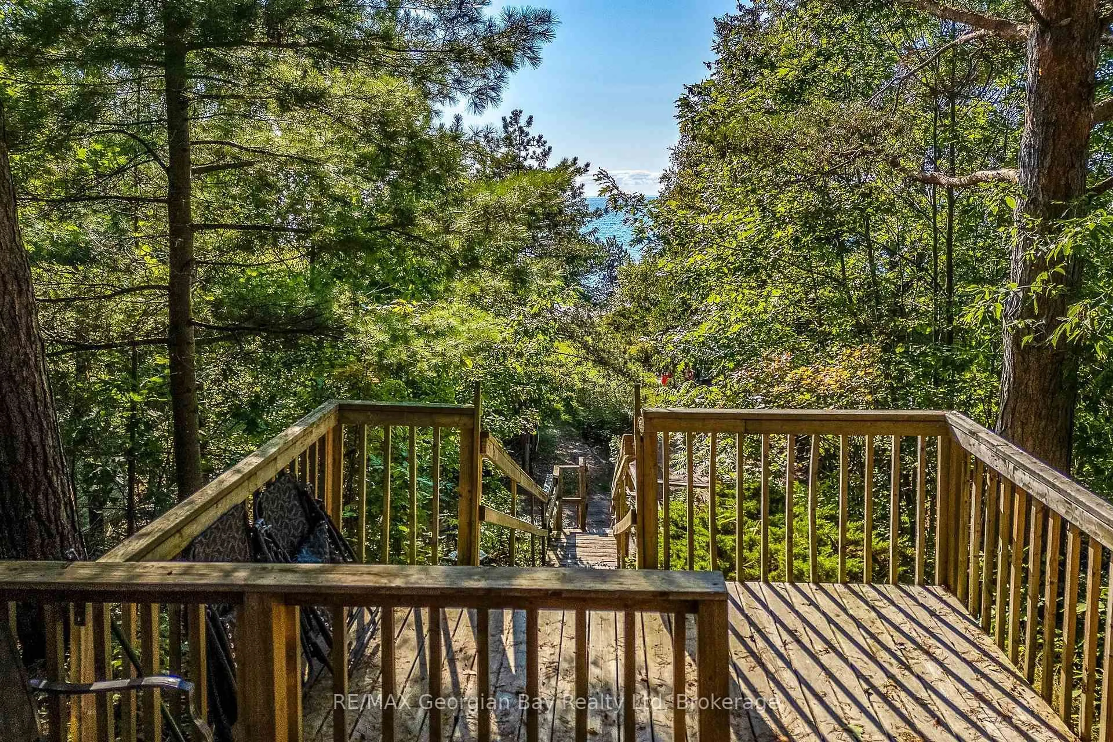 Patio, forest/trees view for 68 Tiny Beaches Rd, Tiny Ontario L0L 2J0