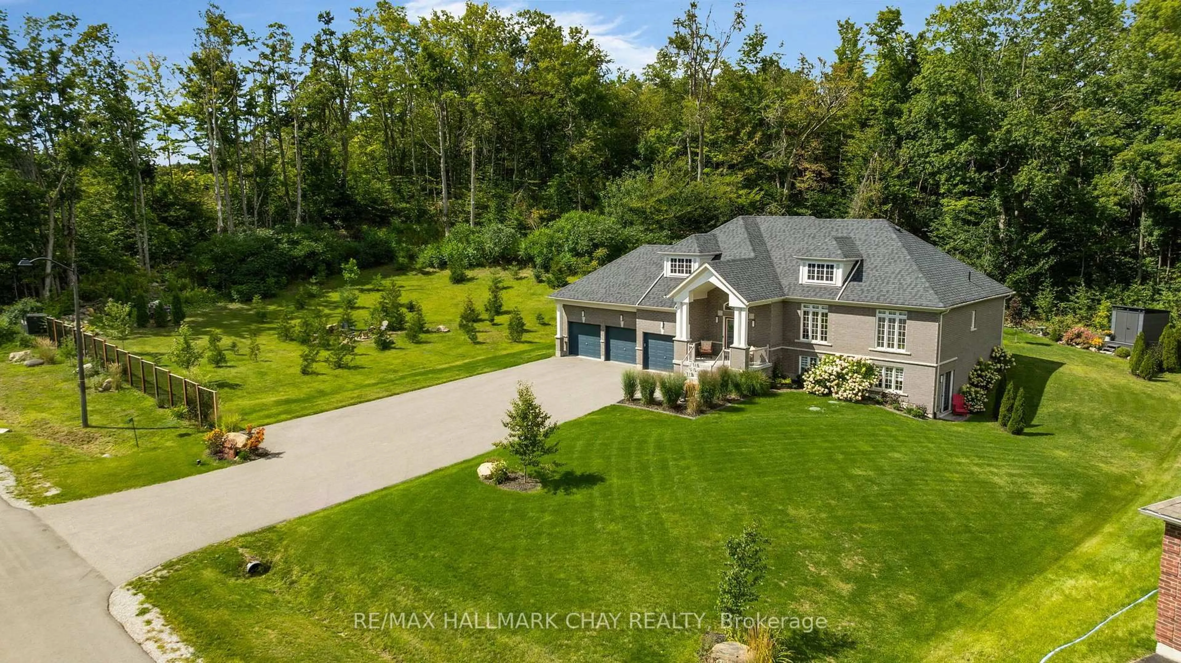 A pic from outside/outdoor area/front of a property/back of a property/a pic from drone, unknown for 21 Ruby Rdge, Oro-Medonte Ontario L0L 2E0