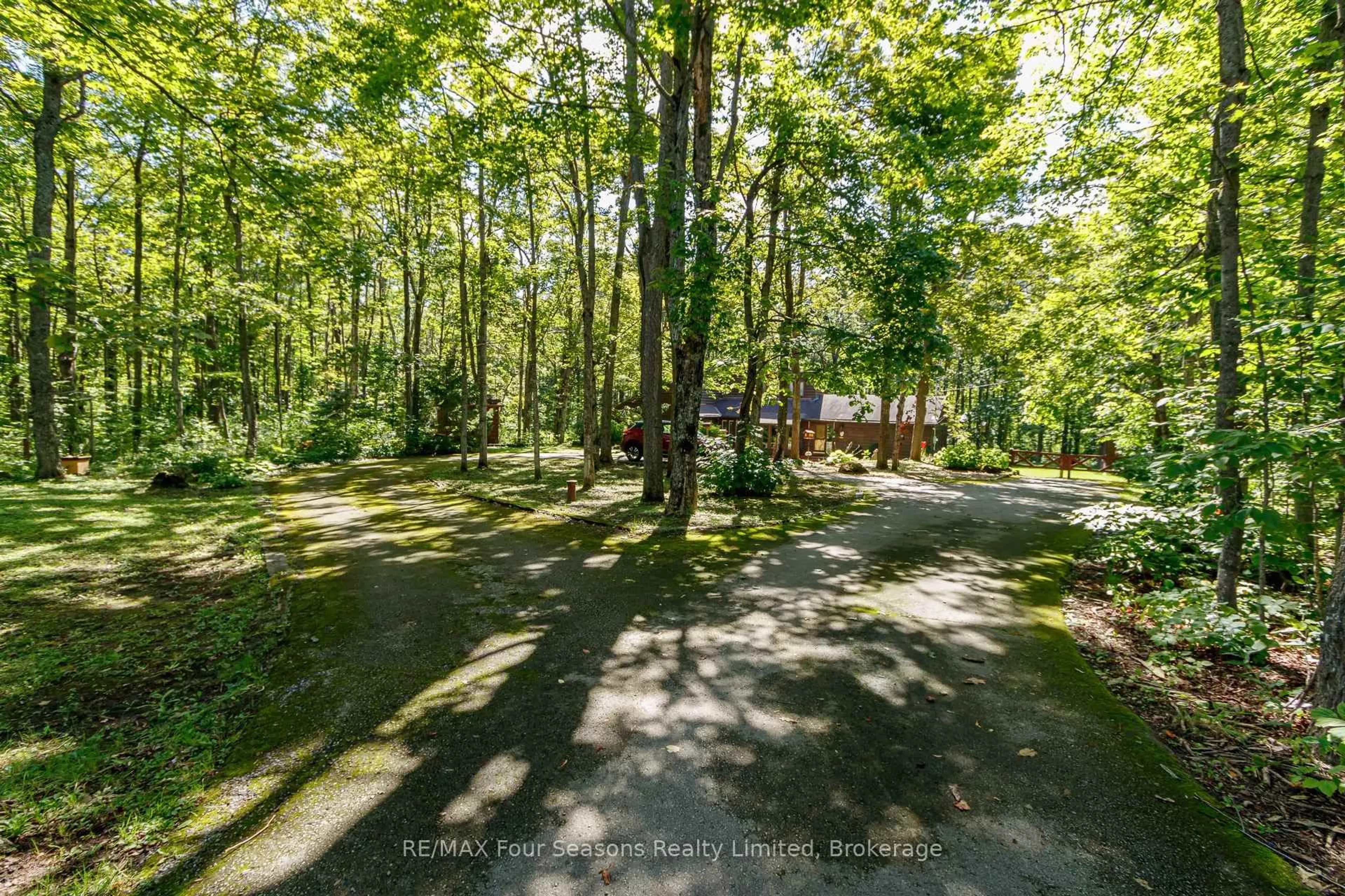 A pic from outside/outdoor area/front of a property/back of a property/a pic from drone, forest/trees view for 1415 County Rd 124, Clearview Ontario L0M 1H0