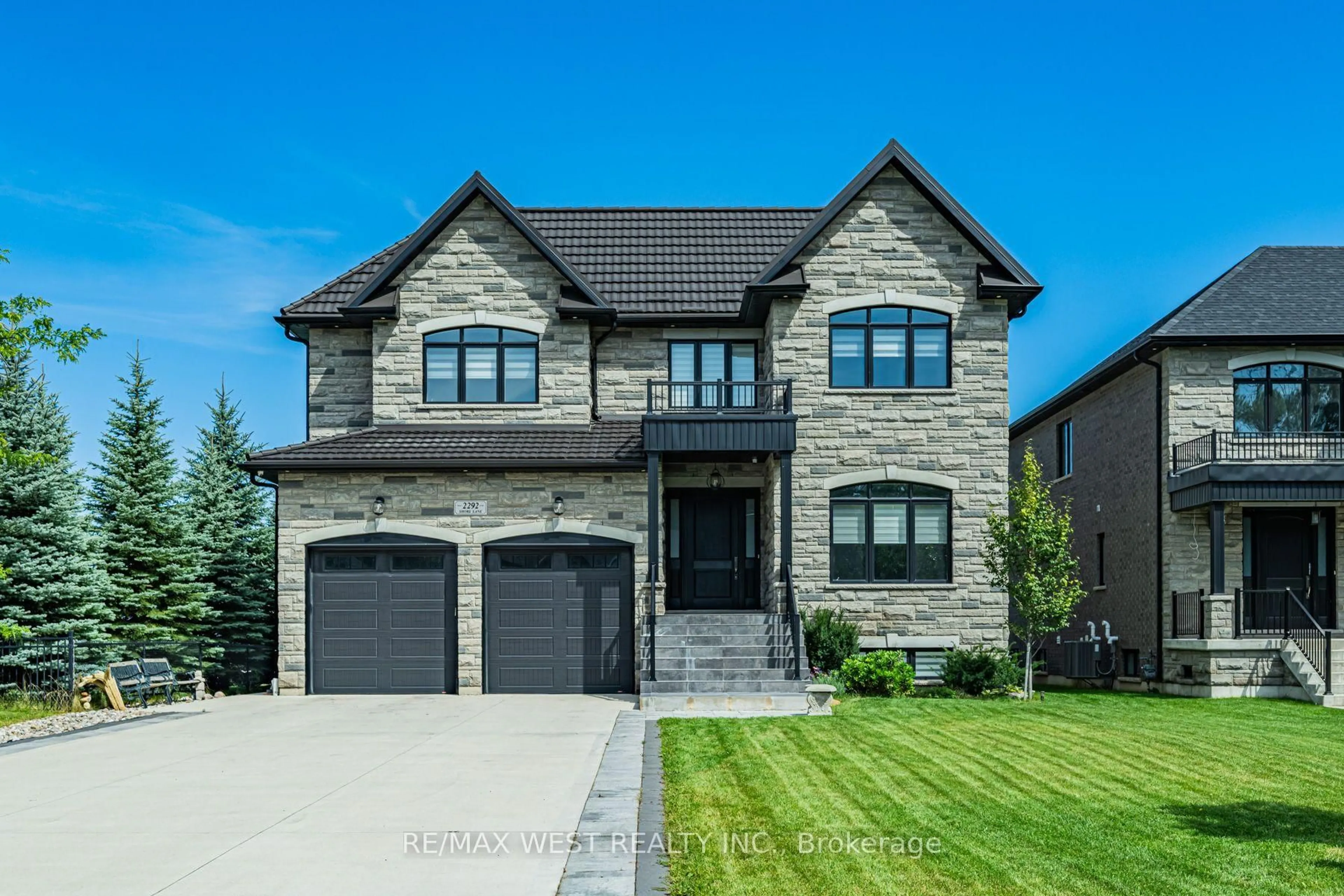 Home with brick exterior material, street for 2292 Shore Lane, Wasaga Beach Ontario L9Z 2X6