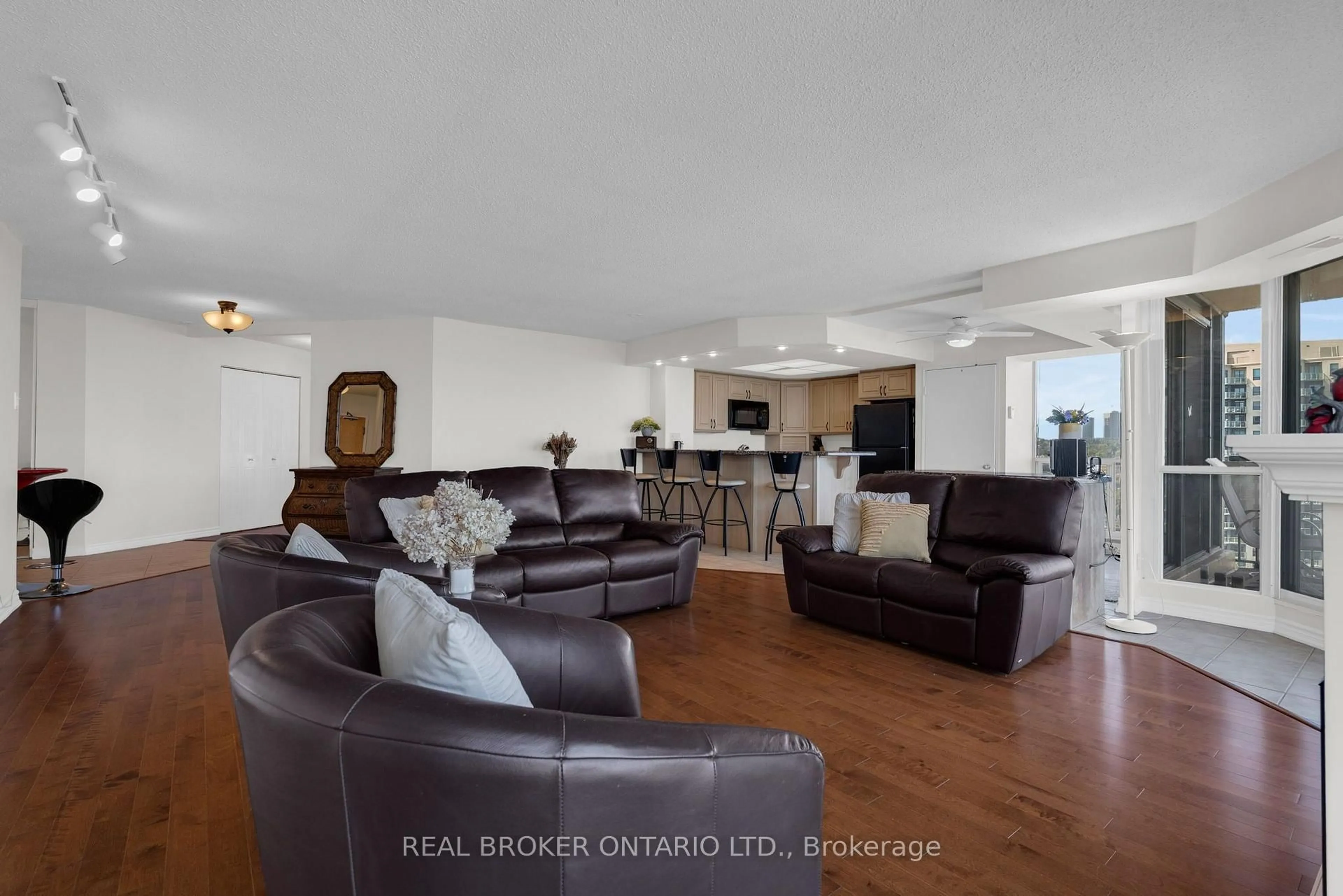 Living room with furniture, unknown for 65 Ellen St #903, Barrie Ontario L4N 3A5
