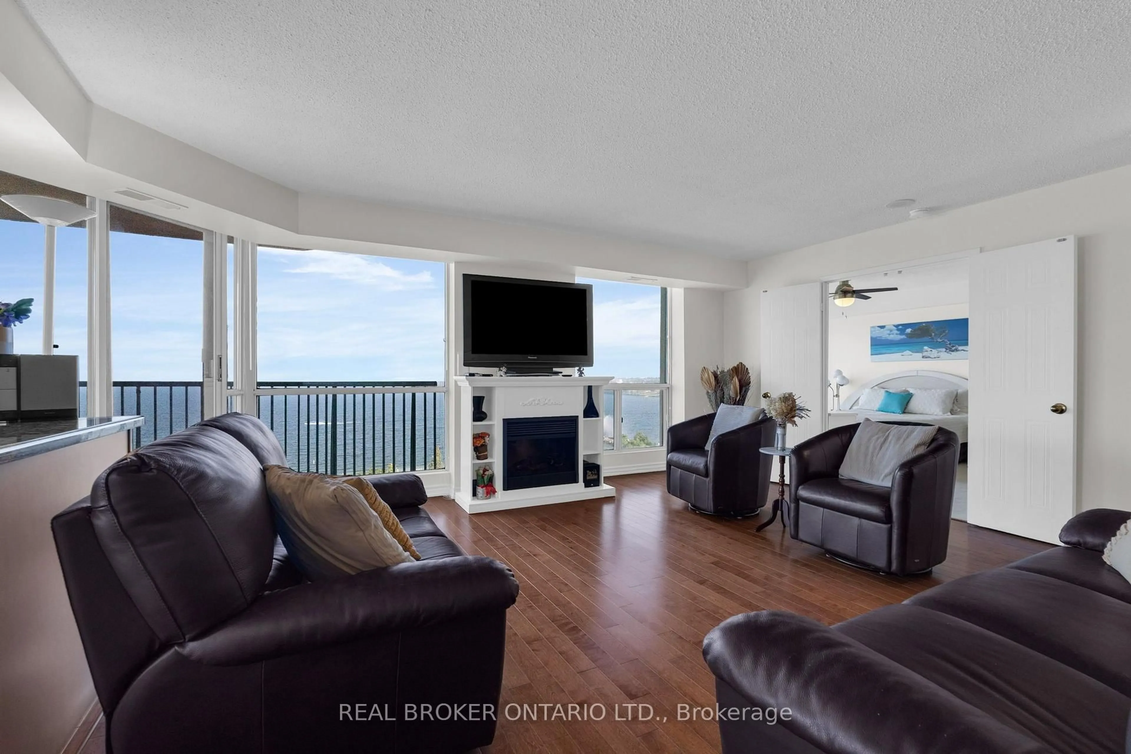 Living room with furniture, unknown for 65 Ellen St #903, Barrie Ontario L4N 3A5