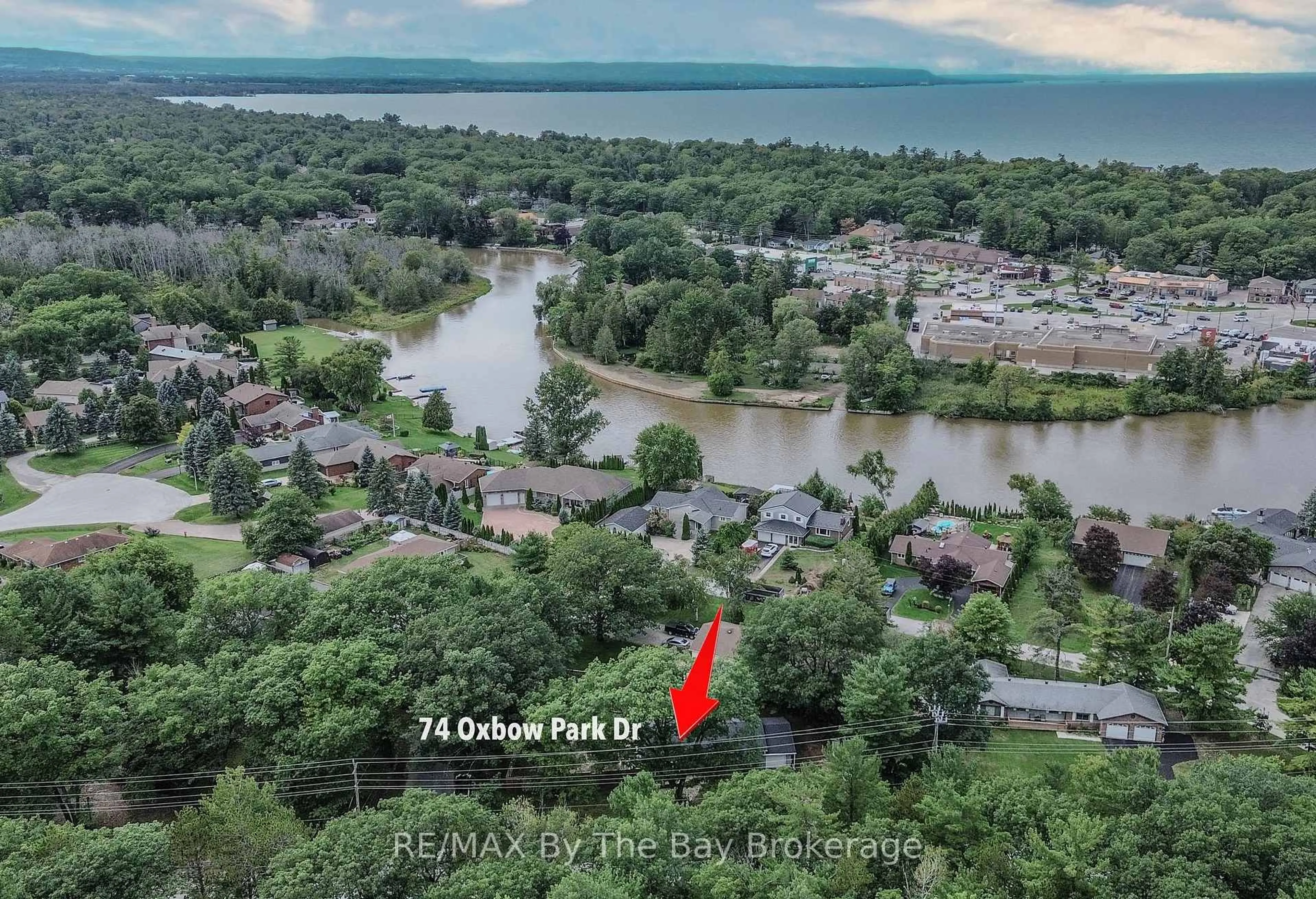 A pic from outside/outdoor area/front of a property/back of a property/a pic from drone, water/lake/river/ocean view for 74 Oxbow Park Dr, Wasaga Beach Ontario L9Z 2V8