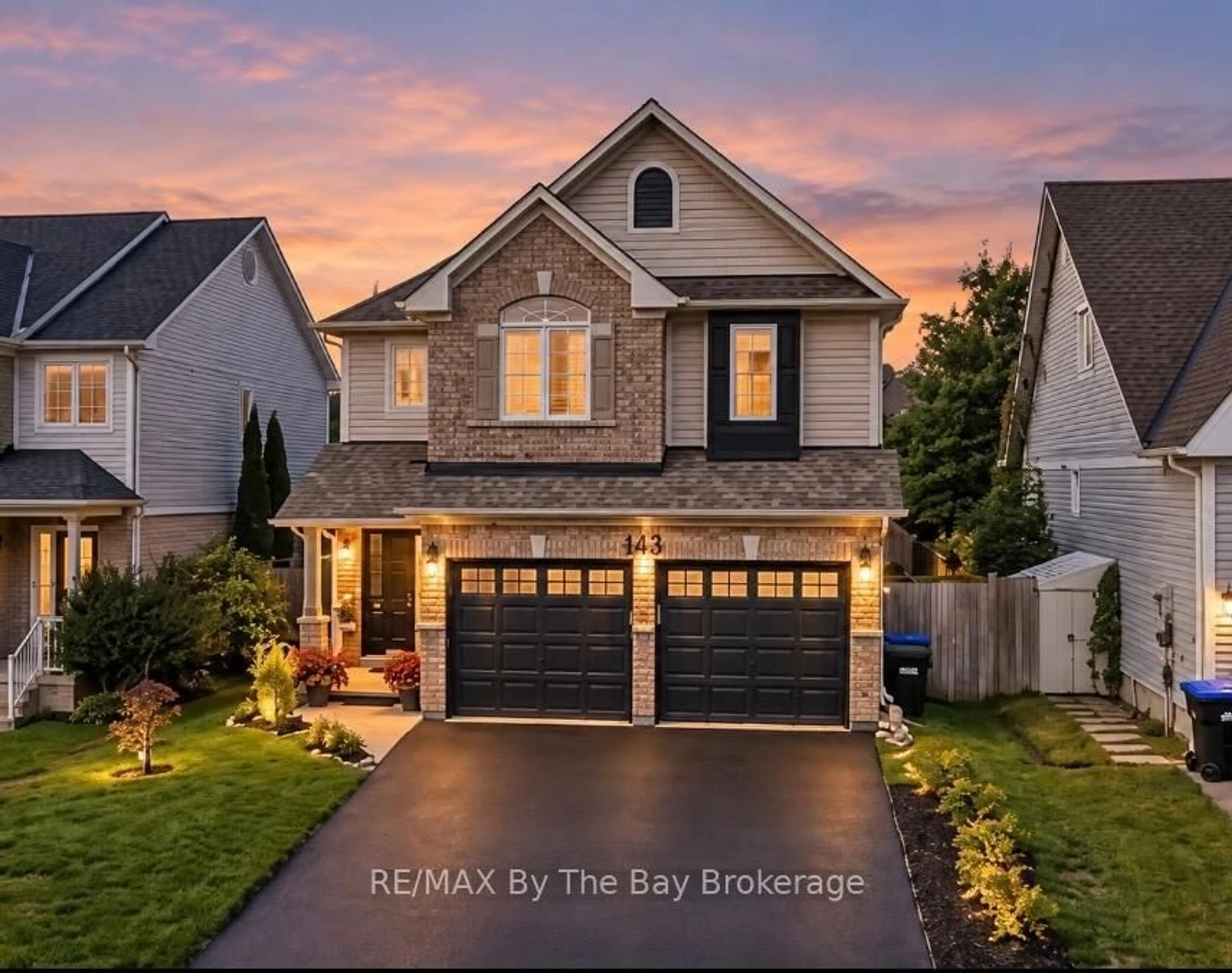 Home with brick exterior material, street for 84 Wesley Ave, Wasaga Beach Ontario L9Z 0B9