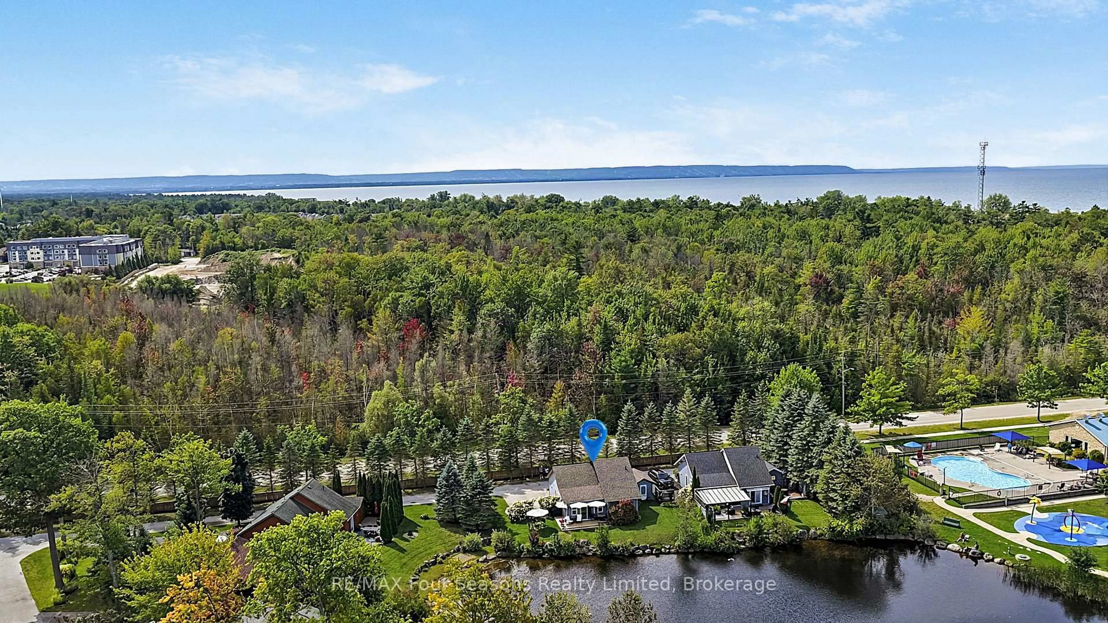 A pic from outside/outdoor area/front of a property/back of a property/a pic from drone, water/lake/river/ocean view for 47 CABIN Cres, Wasaga Beach Ontario L9Z 1X7