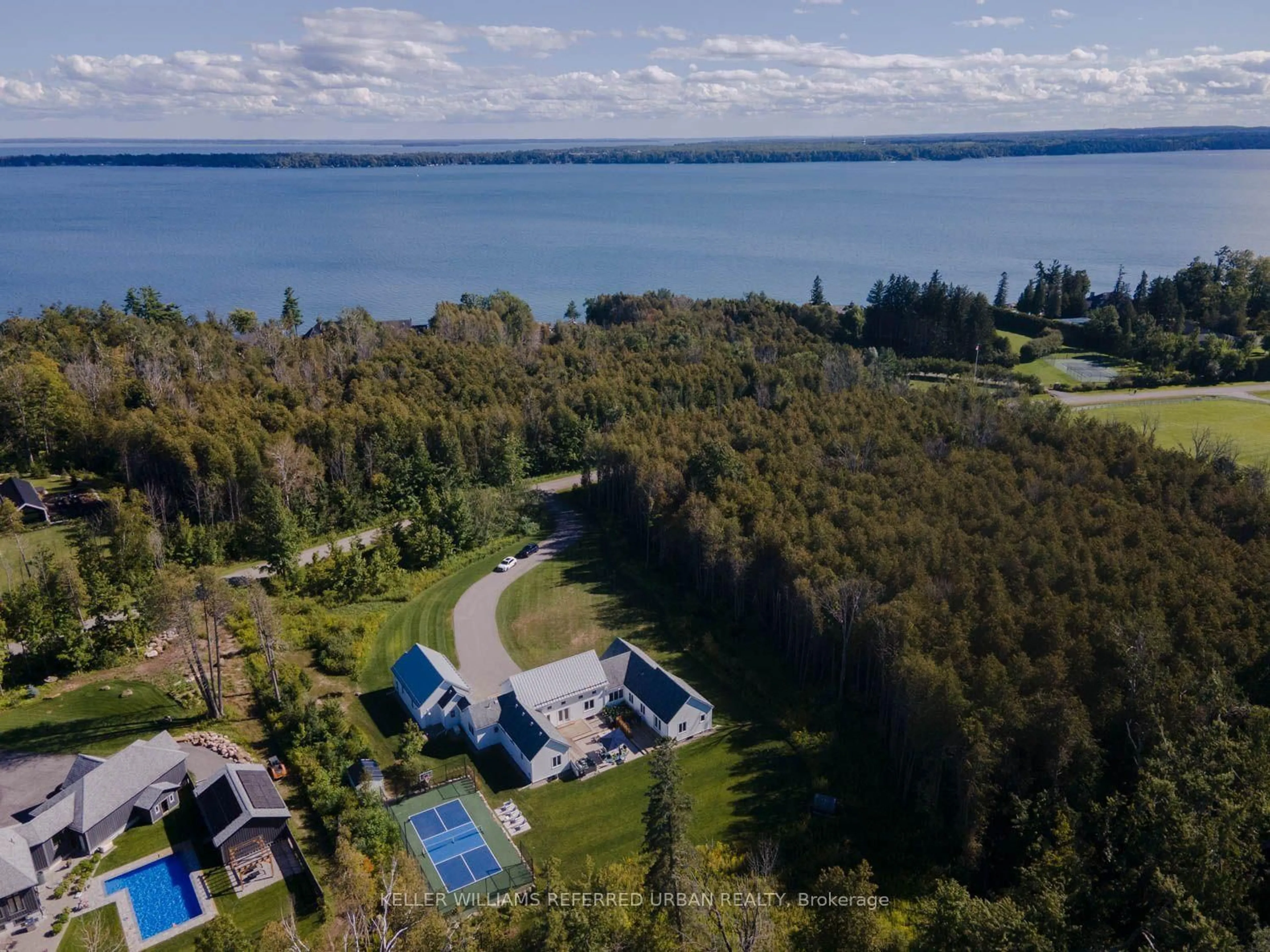 A pic from outside/outdoor area/front of a property/back of a property/a pic from drone, water/lake/river/ocean view for 24 Windfield Dr, Oro-Medonte Ontario L0L 2L0