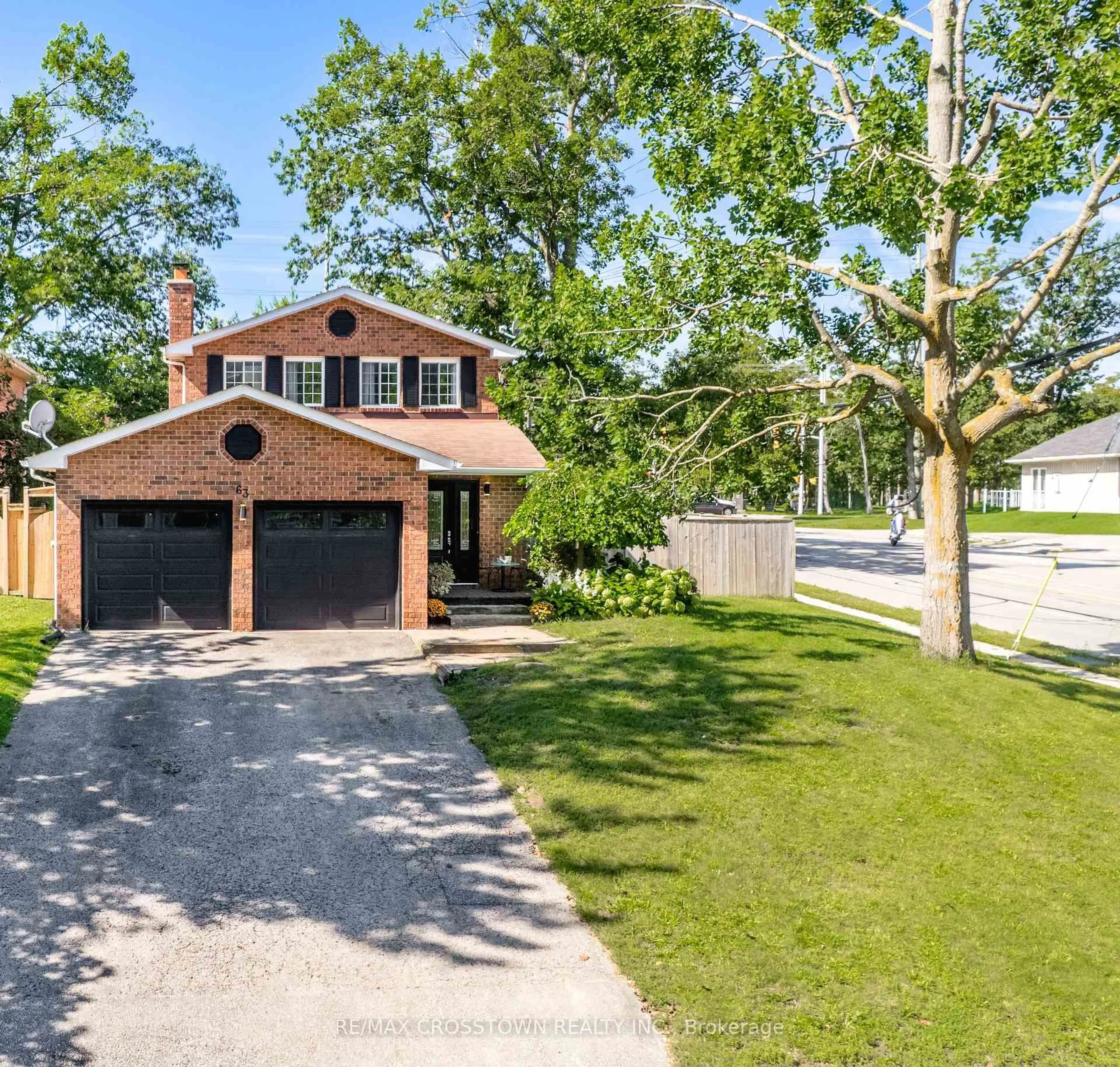 Home with brick exterior material, street for 63 Oakridge Dr, Barrie Ontario L4N 5N6