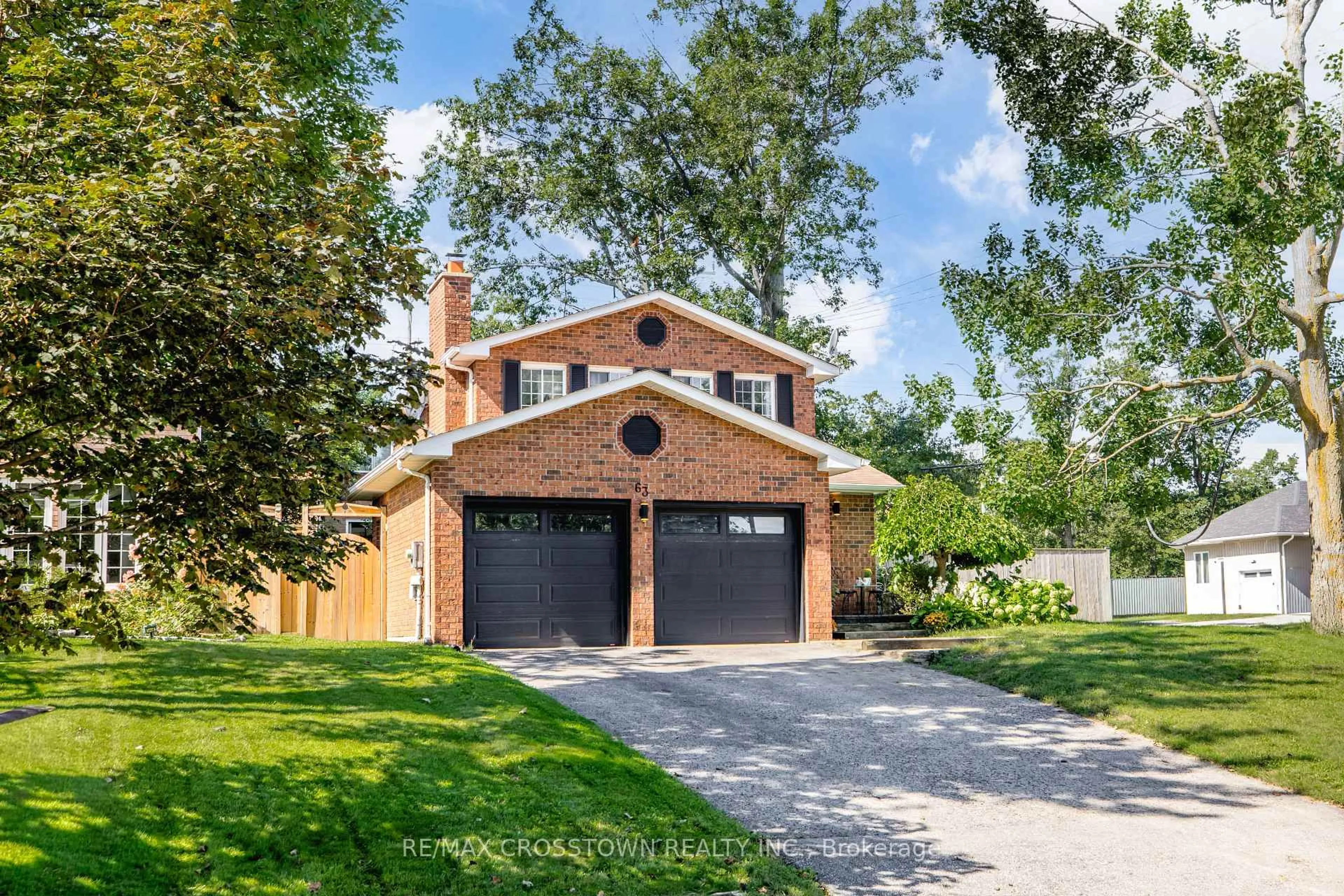 Home with brick exterior material, street for 63 Oakridge Dr, Barrie Ontario L4N 5N6